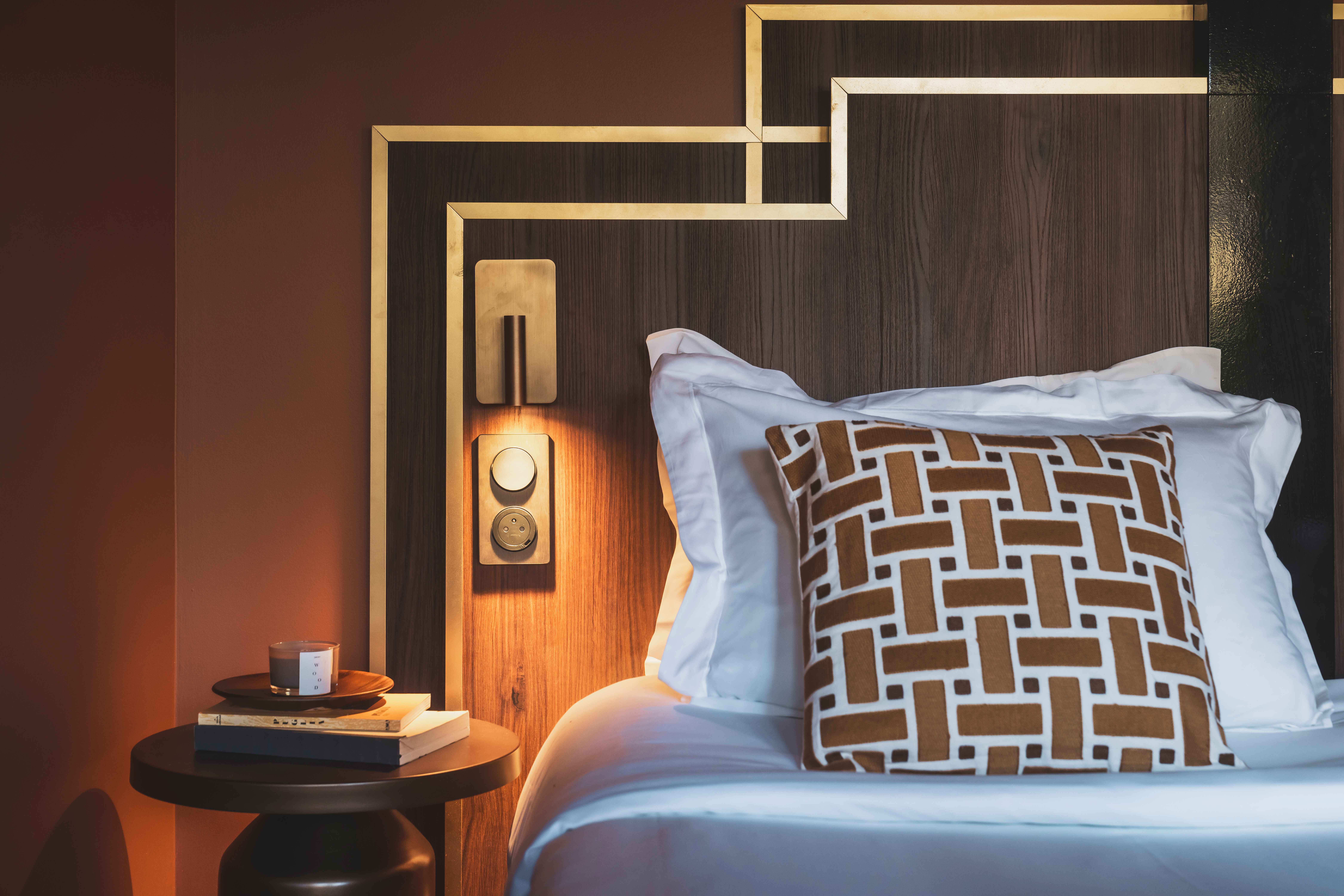 image Elegant details and soft lighting bring a touch of modern Art-Deco charm to your stay.
