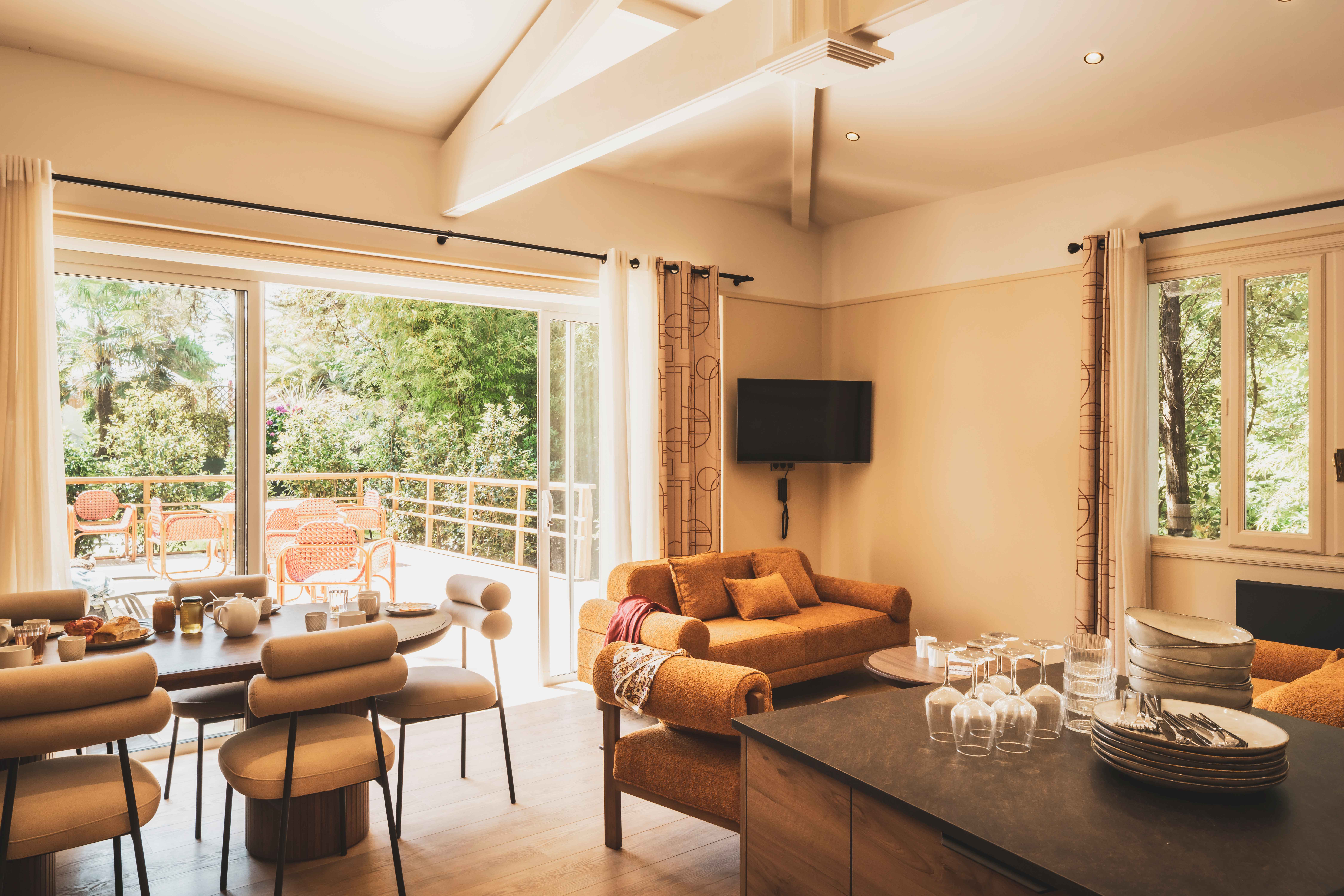 image A bright and open dining space overlooking the gardens — perfect for shared meals in a calm setting.