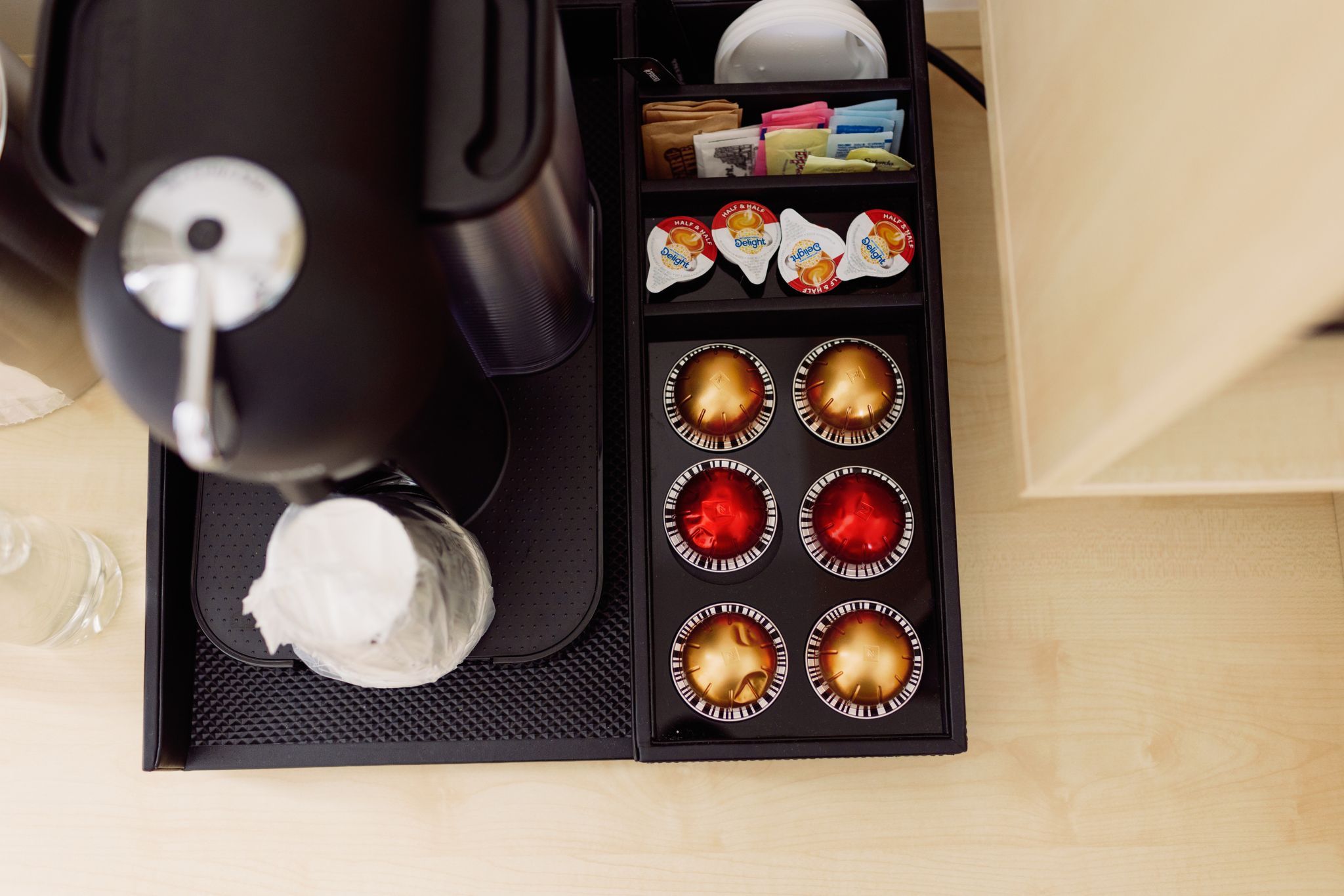 image A state-of-the-art Nespresso coffee maker awaits, making mornings by the lake blissfully indulgent.