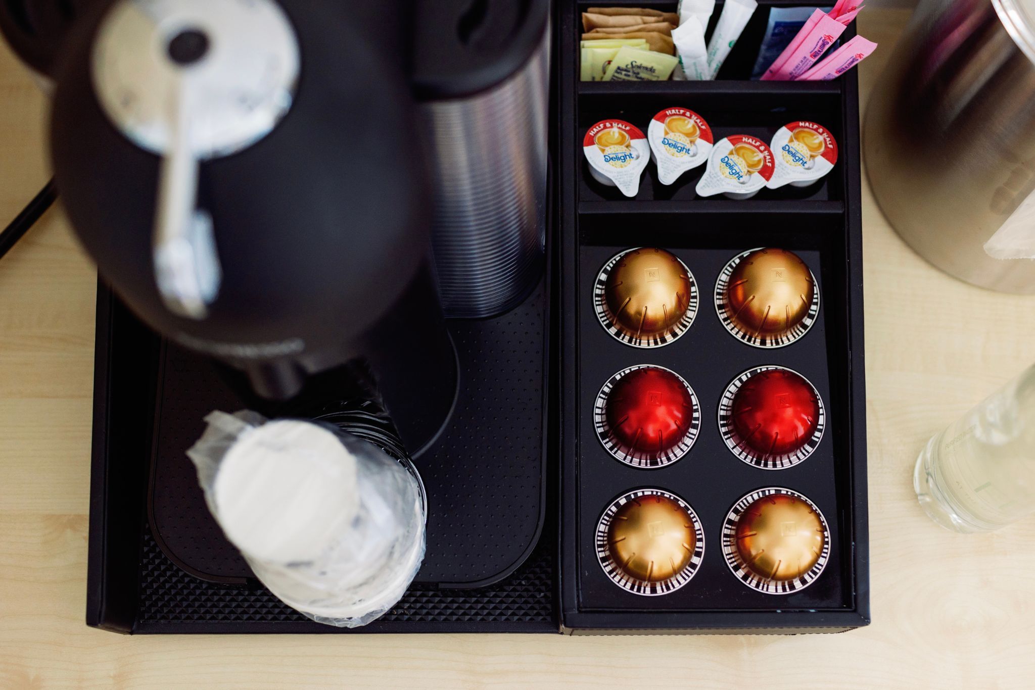 image Start your day with gourmet coffee from the Nespresso machine, embracing a perfect blend of flavor and convenience.