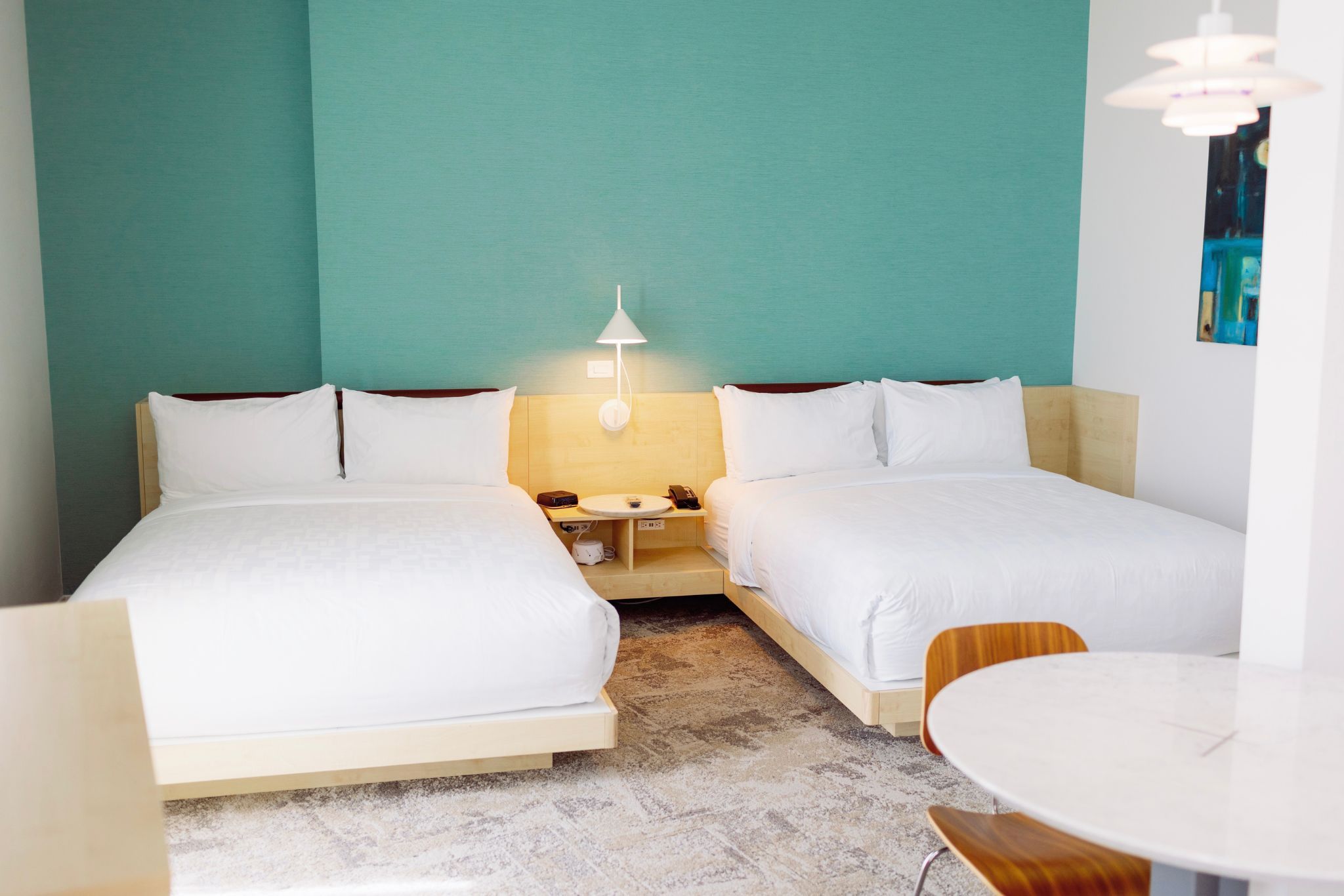 image Bright and airy, this beautifully designed room offers a peaceful sanctuary with chic decor and ample space to relax after a day in the city.