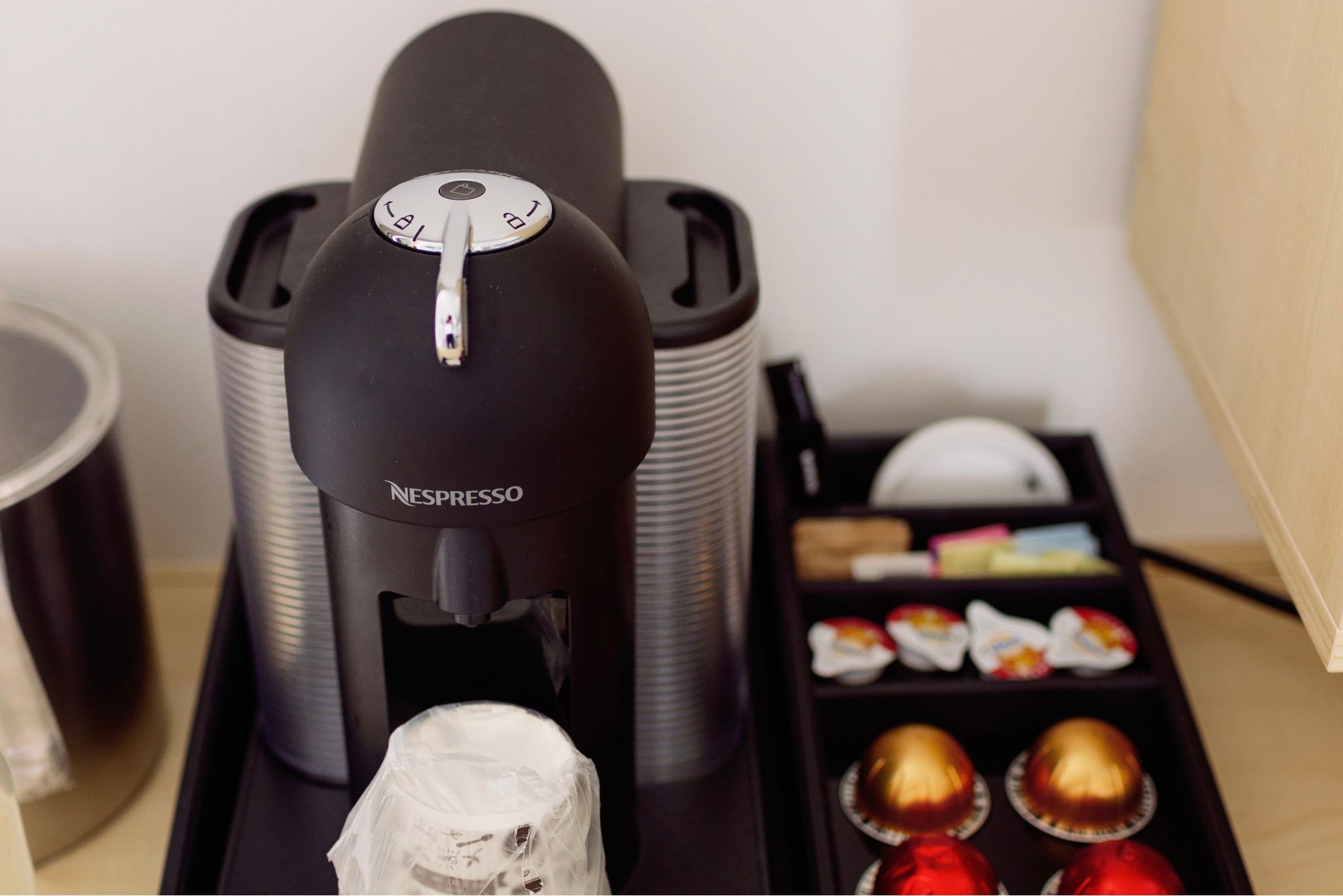 image The sleek Nespresso machine adds a touch of luxury, complementing the accessible amenities for a seamless and enjoyable stay.