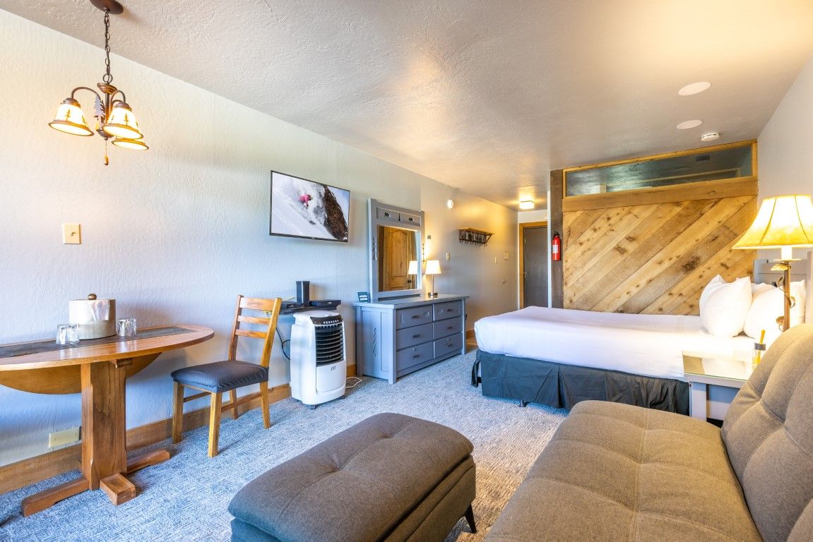 image An open layout showcases modern amenities and warmth, perfect for a comfortable stay after outdoor adventures.