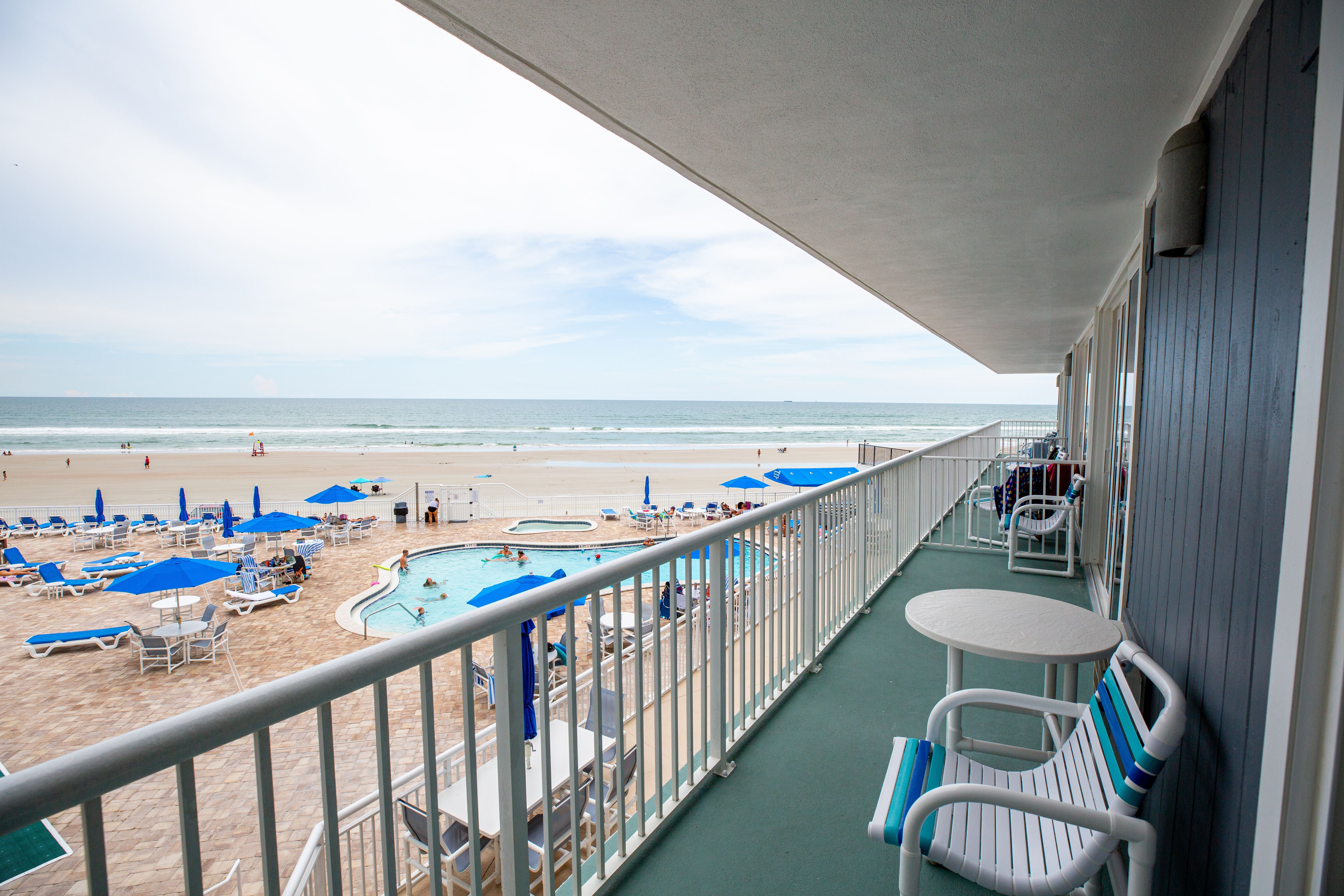 image Step onto the private balcony and enjoy breathtaking ocean views, perfect for relaxing while soaking up the sun.