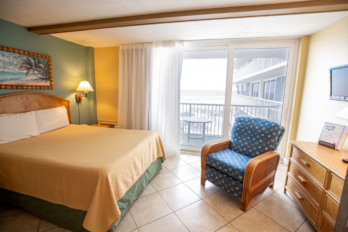 image This cozy studio features a queen bed and a comfortable seating area, perfect for relaxation while enjoying ocean views.