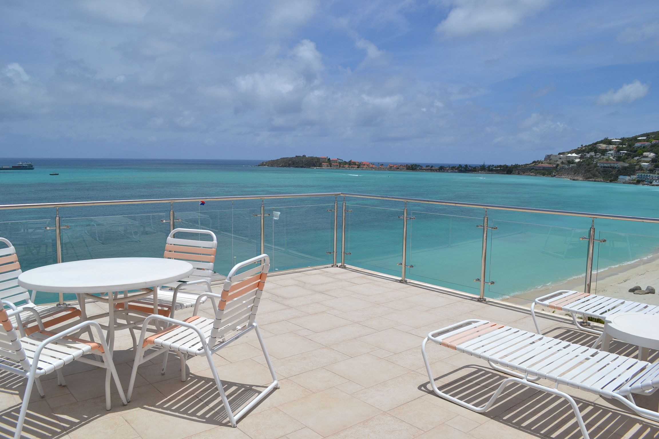 image Step out onto your private balcony, where you can sip your morning coffee while taking in the breathtaking turquoise waters of the Caribbean.
