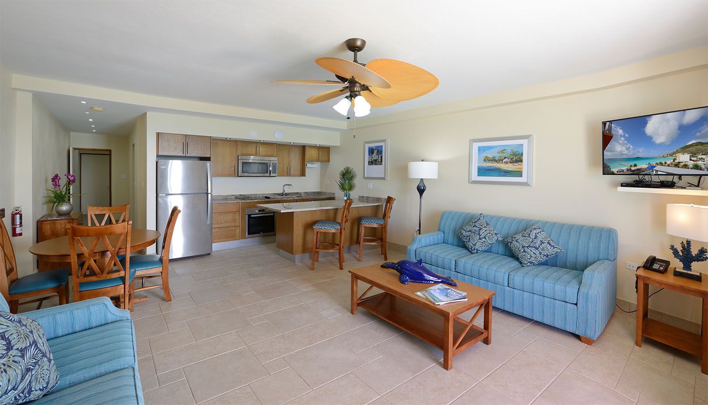 image Experience the elegance of this spacious living area, complete with modern furnishings and a relaxing ambiance, perfect for unwinding after a day at the beach.