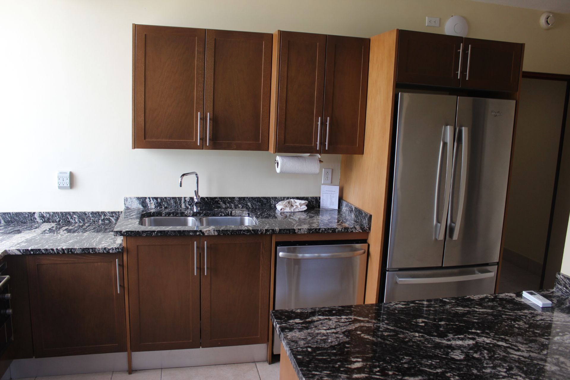 image This fully equipped kitchen features sleek granite countertops and stainless steel appliances, making cooking a delightful experience during your stay.