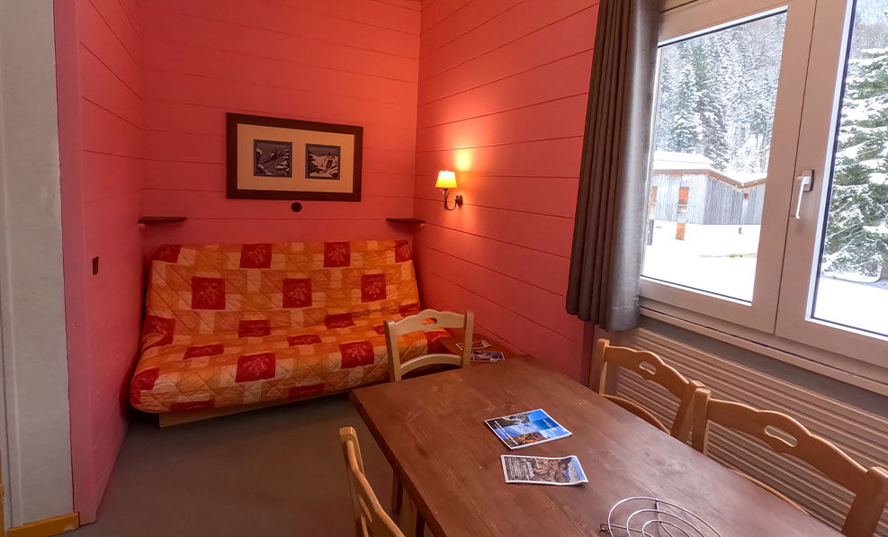 image Warm mountain-style décor enhances the inviting atmosphere, perfect for relaxation after a day of skiing or hiking.