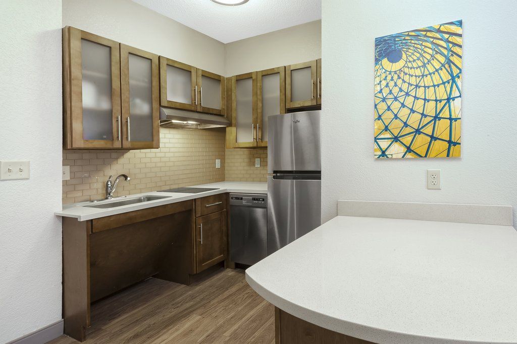 image Feel at home with ample space in our stylish kitchen layouts!