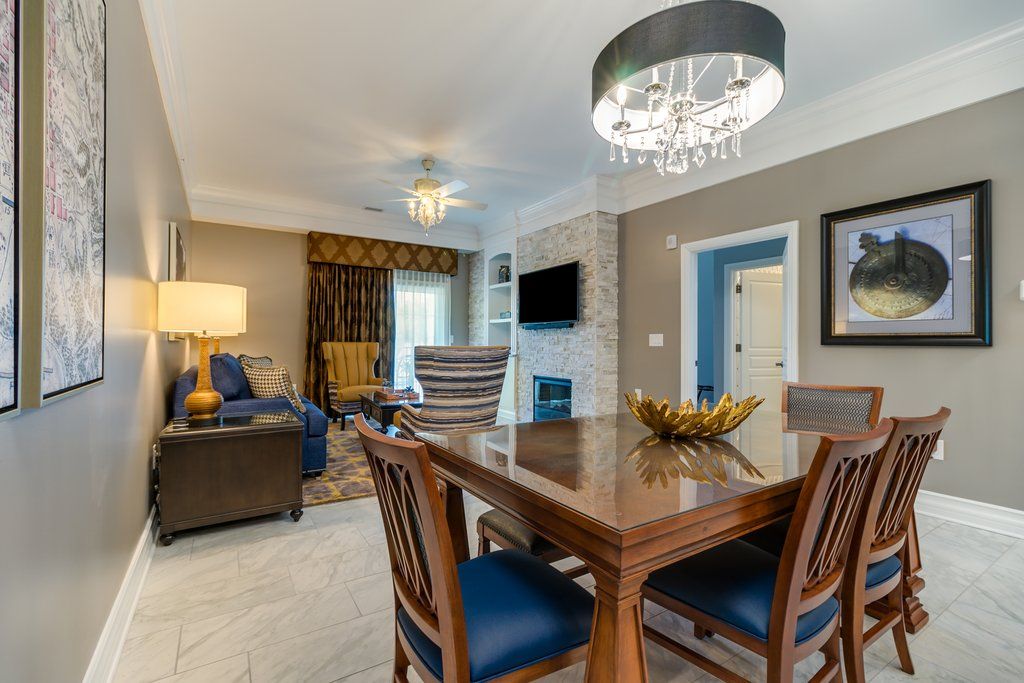 image A beautiful dining area complements the living space, showcasing elegant decor and comfortable seating for family meals.