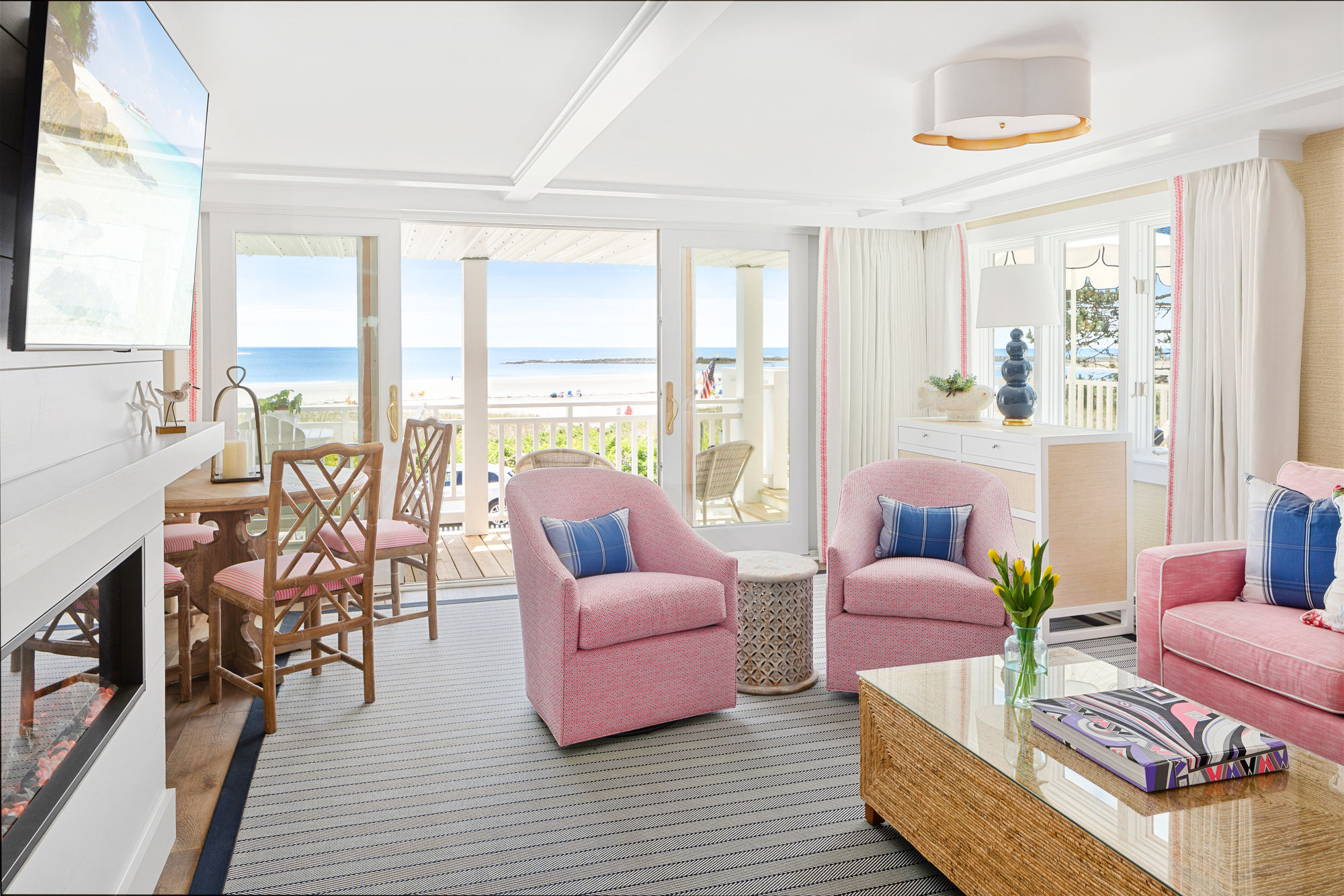image This charming living room blends comfort with coastal elegance, showcasing beautiful decor and direct access to the scenic beach from the patio.