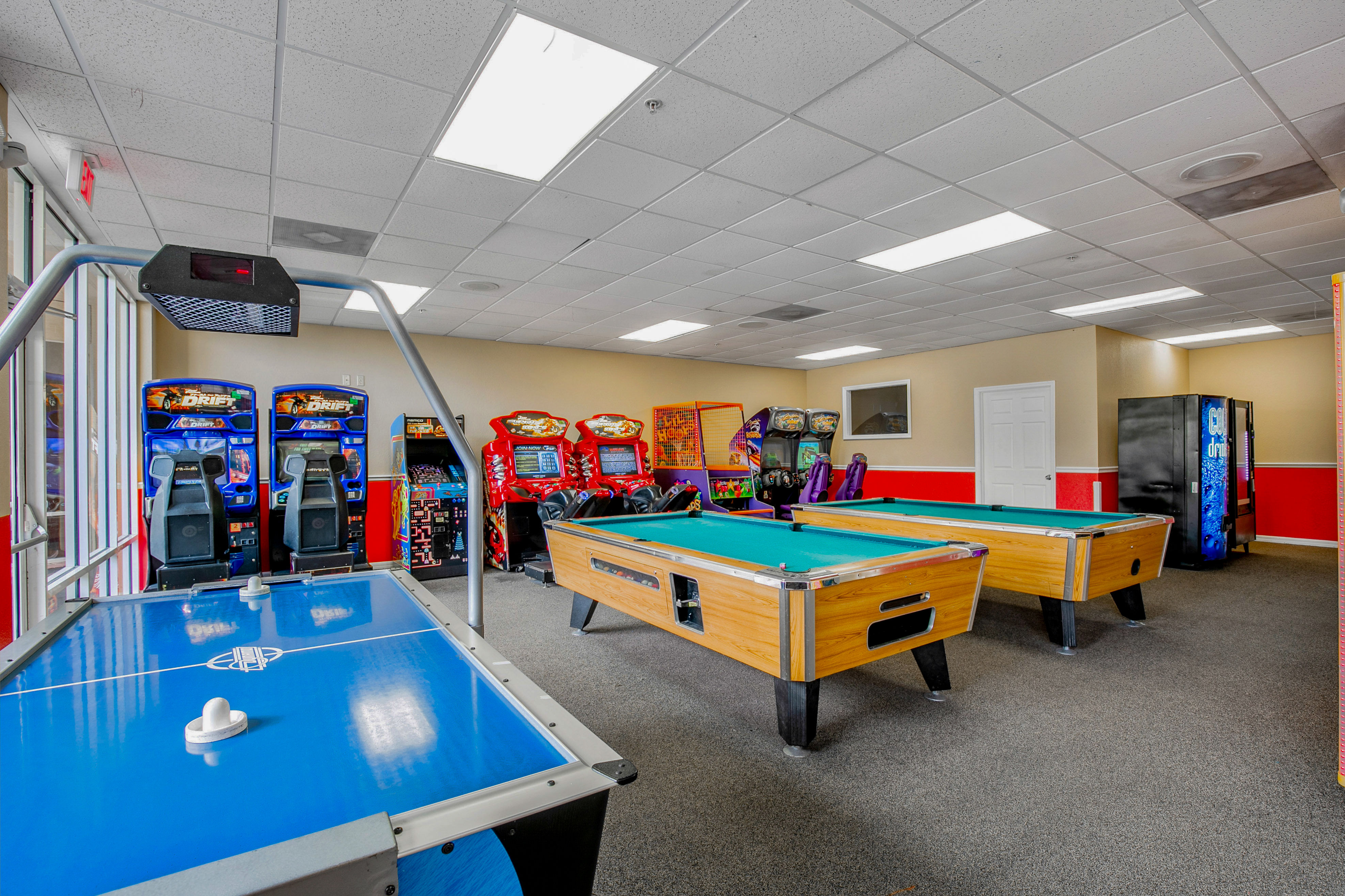 image A vibrant game room featuring pool tables and arcade games for endless entertainment.