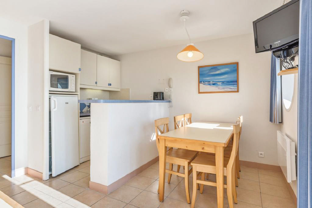 image Whip up a meal or enjoy a cup of coffee in this inviting kitchenette.