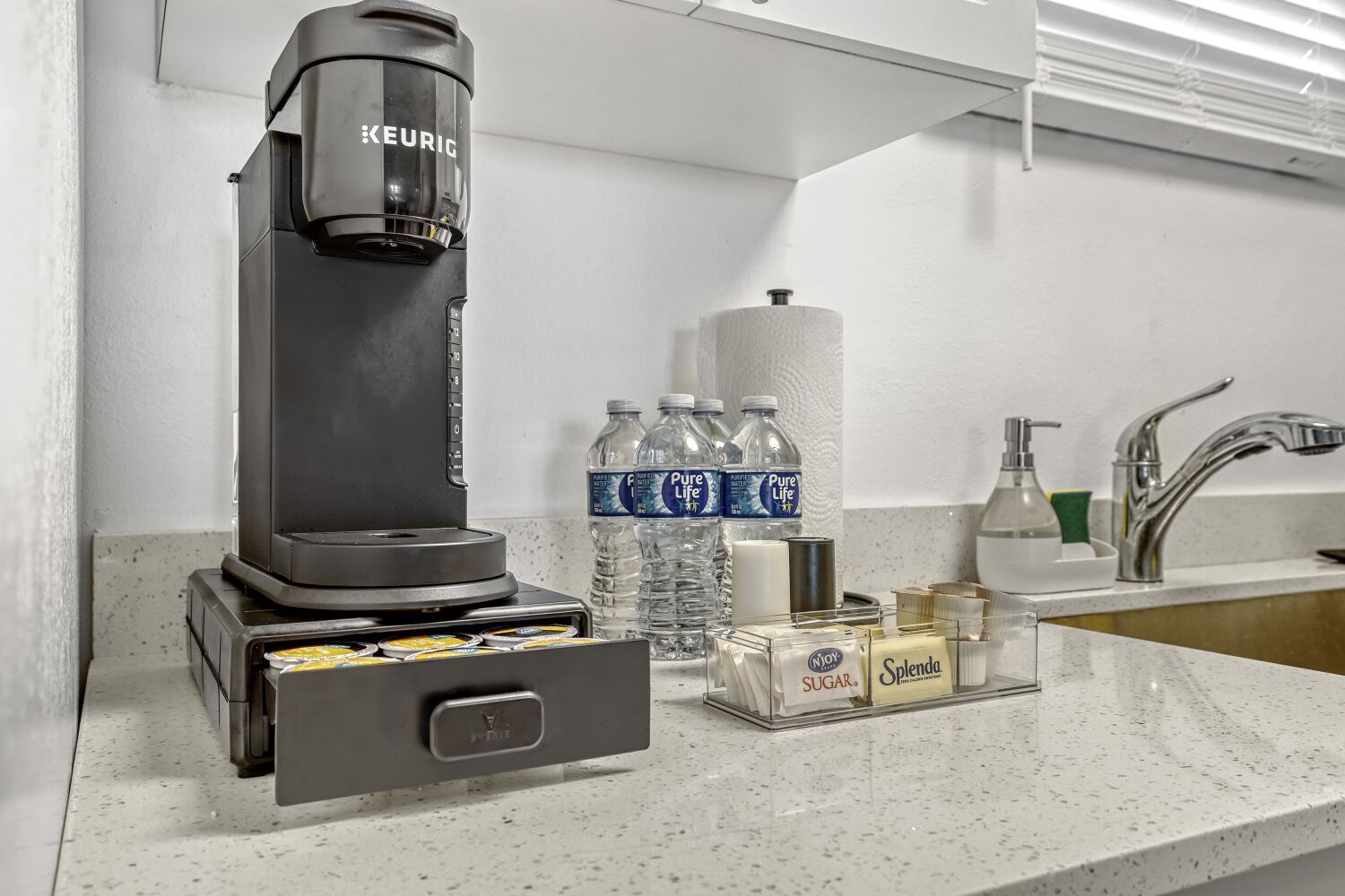 image Start your day right with a dose of coffee from this Keurig coffee maker.