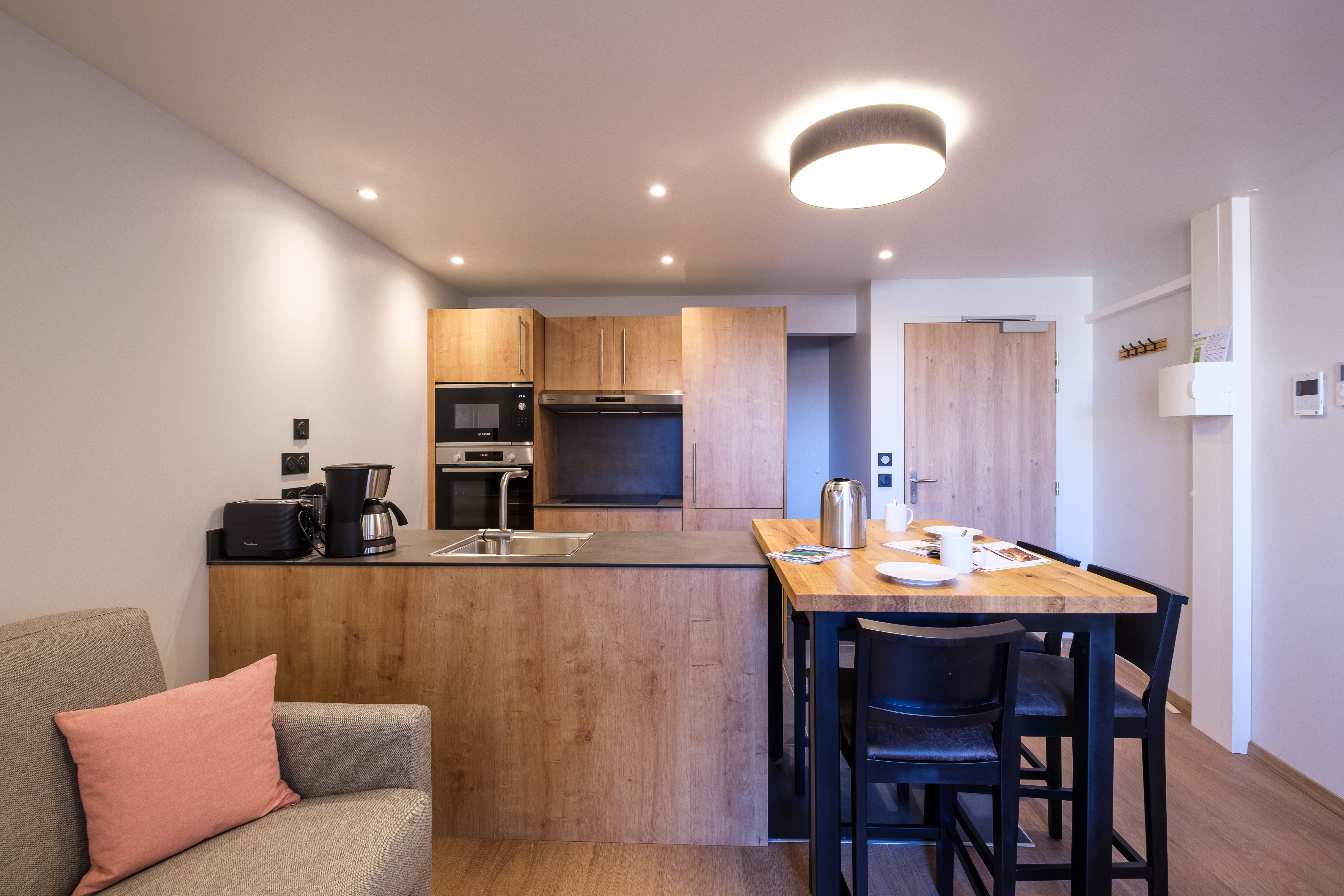 image The fully equipped kitchen features modern appliances and generous counter space, making meal preparation easy and enjoyable.