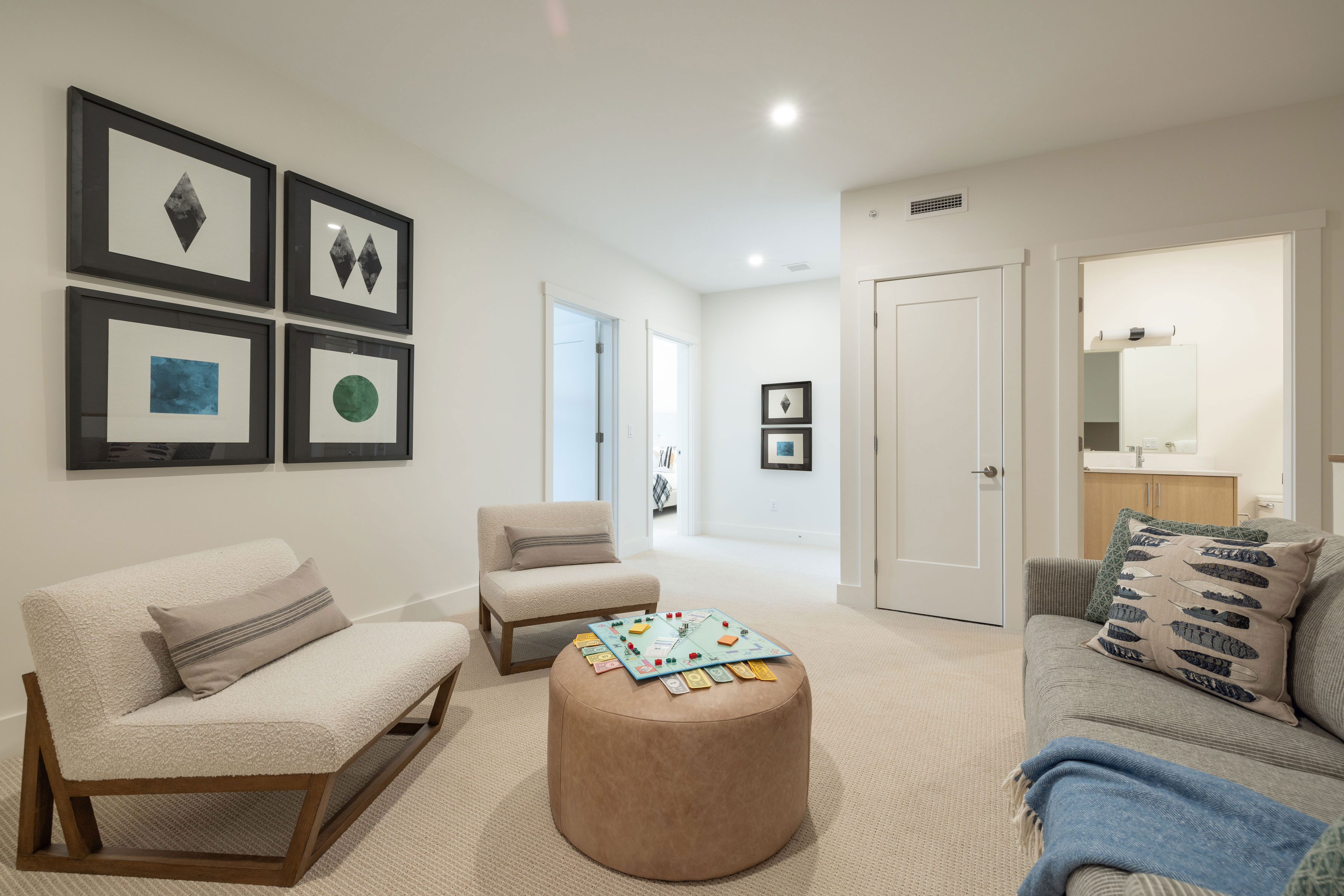 image A comfortable secondary living space adds flexibility for groups, offering a relaxed spot for games, conversation, or downtime.