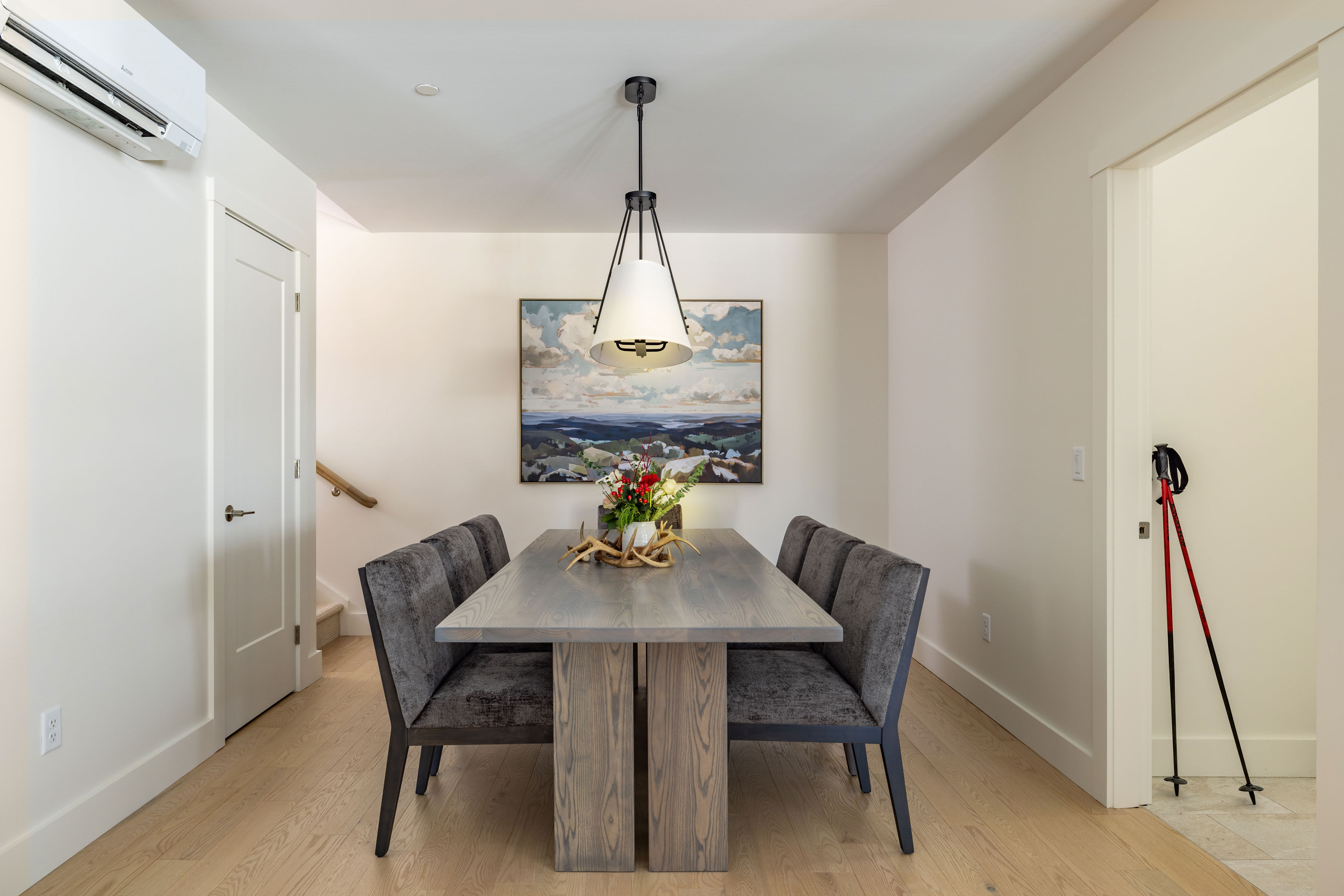 image The dining area provides ample seating for group meals, making it easy to gather everyone together after skiing or exploring Okemo.