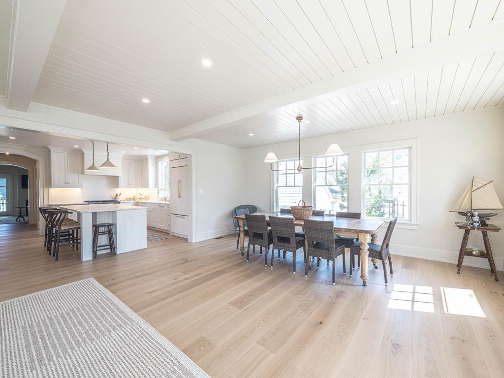 image An inviting dining area that connects seamlessly to the kitchen, bathed in natural light, ideal for family gatherings.