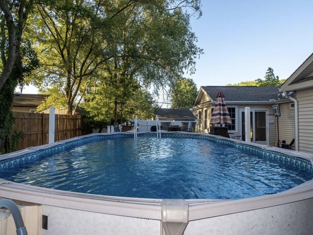 image The refreshing private pool invites you to unwind and soak up the sun in a tranquil outdoor setting.