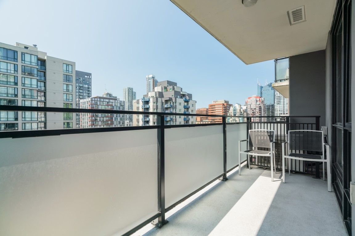 image Step onto the spacious balcony, which provides a perfect retreat for enjoying your morning coffee while soaking in the vibrant cityscape.