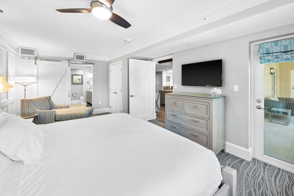 image Comfortable bedroom offering cozy furnishings and a relaxing atmosphere for restful nights.