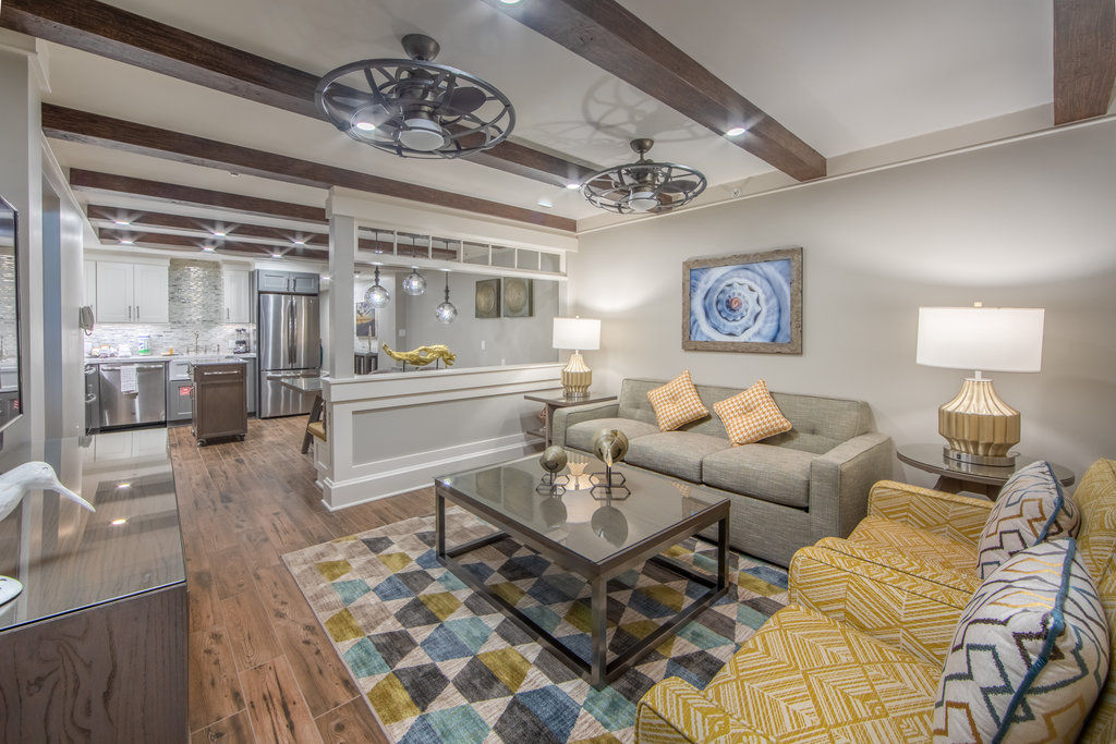 image Bright living area with comfortable seating and a relaxed layout, ideal for unwinding after a beach-filled day.