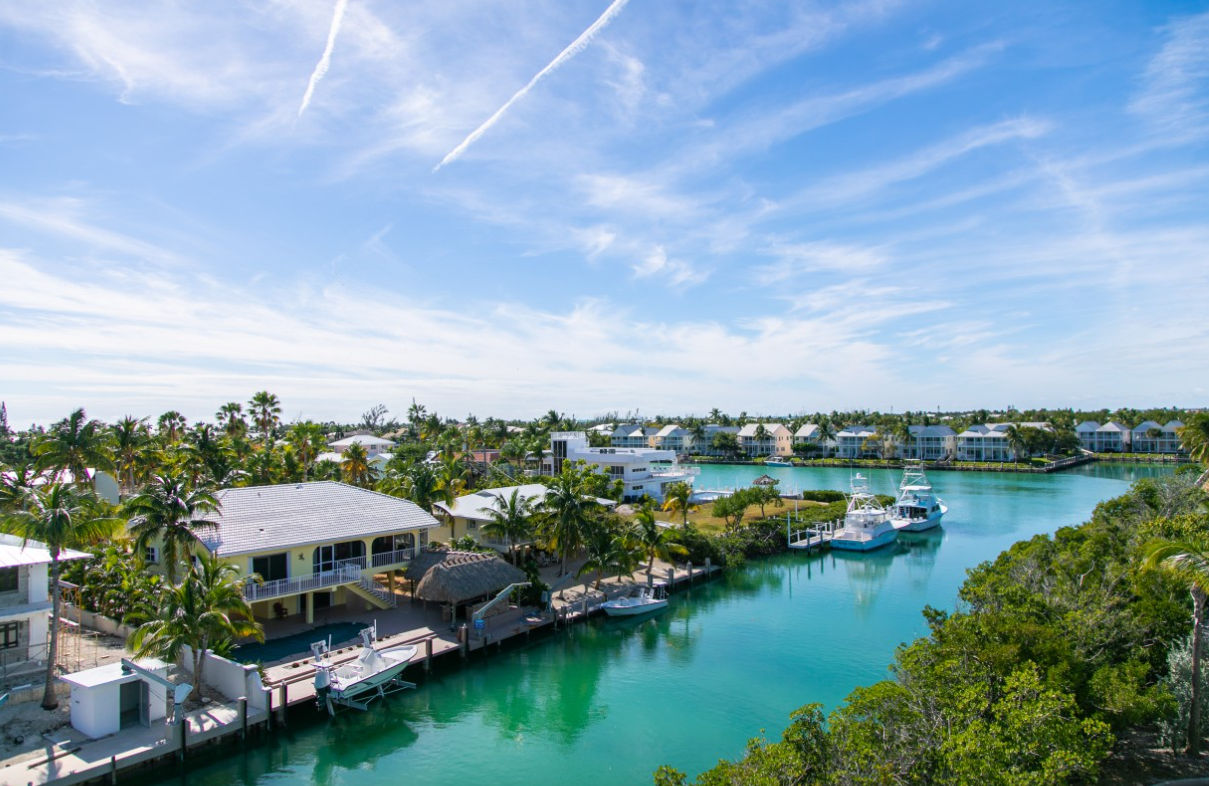image Soak in the endless blue waters and lush greenery of the Keys, where every moment unfolds with a backdrop of paradise.
