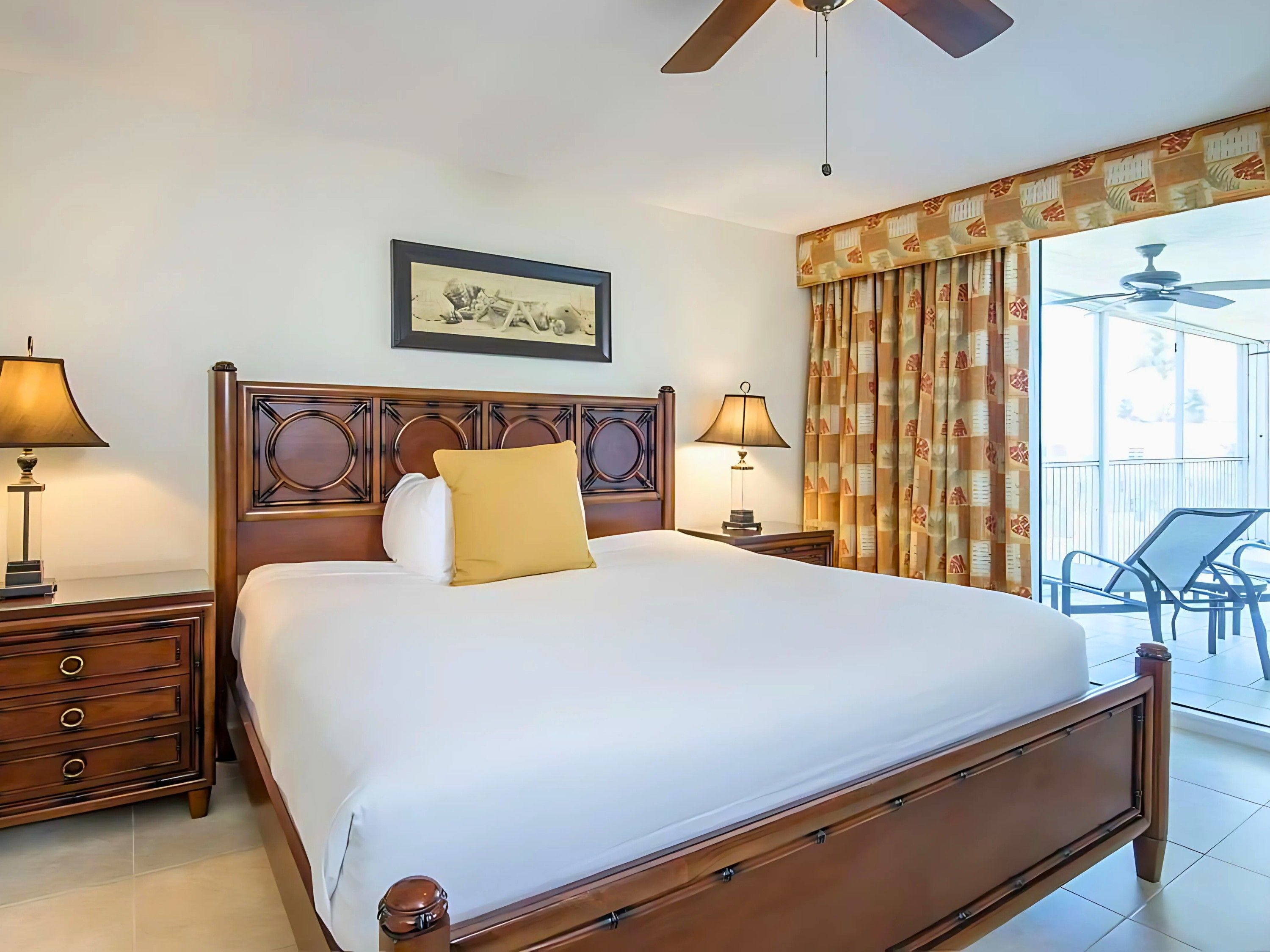 image Awaken to ocean breezes in a plush master suite that blends elegance with island charm, perfect for your tropical getaway.