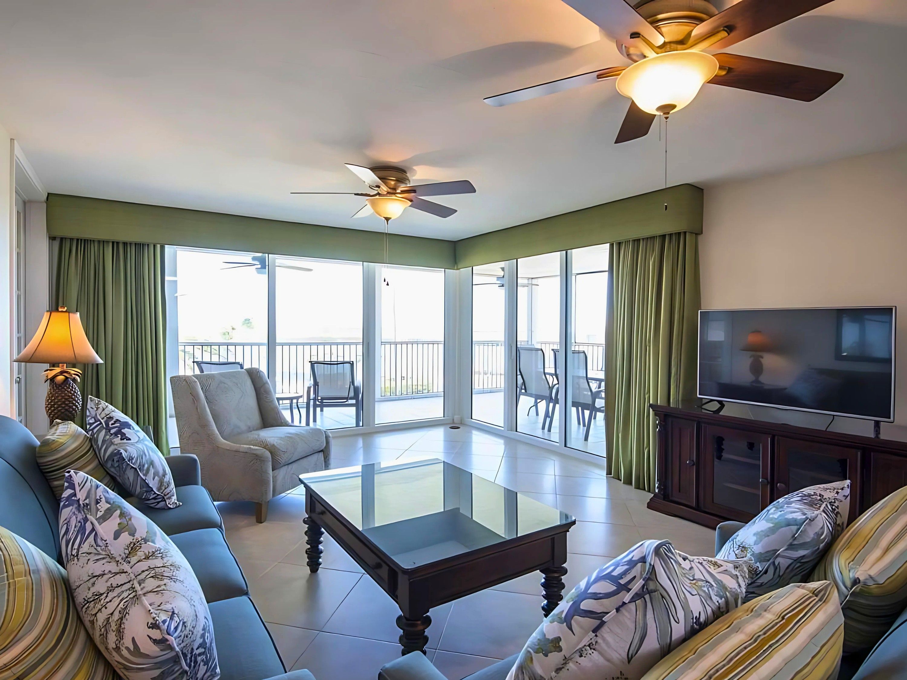 image Unwind in the light-filled living space, where a gentle sea breeze dances through, beckoning you to relax and soak in the views.