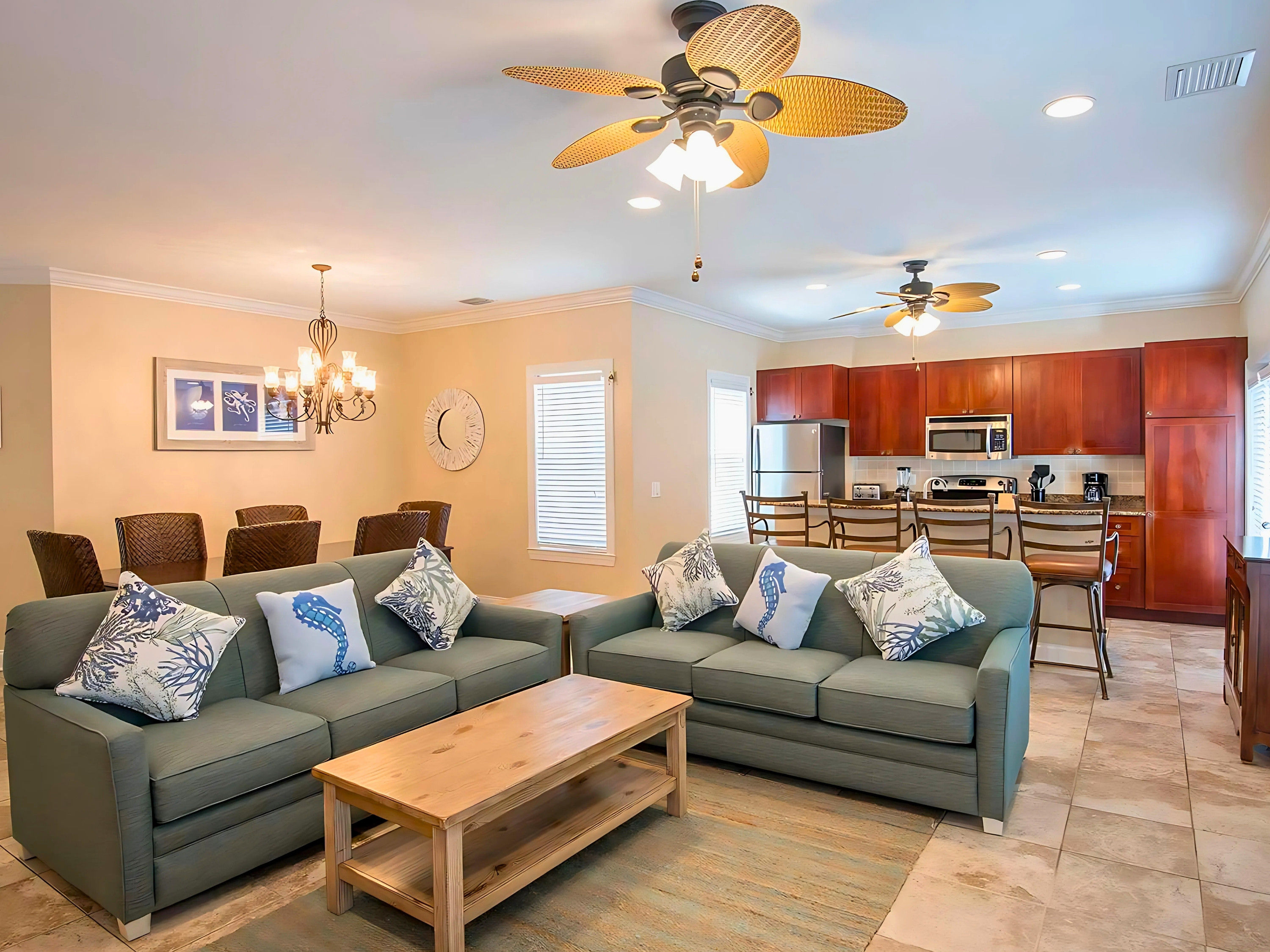 image Gather last-minute memories in the airy living area—a perfect blend of coastal decor and modern conveniences to inspire laughter and joy.