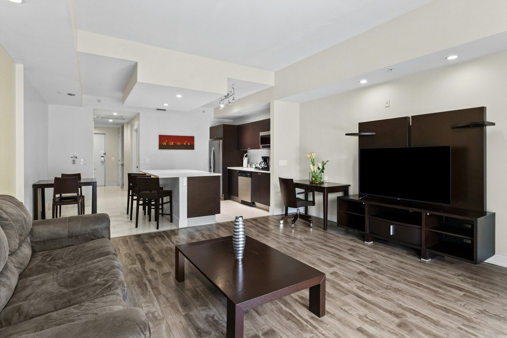 image Bright open living space with modern furnishings and clean lines, designed for relaxing together after a day in Miami.