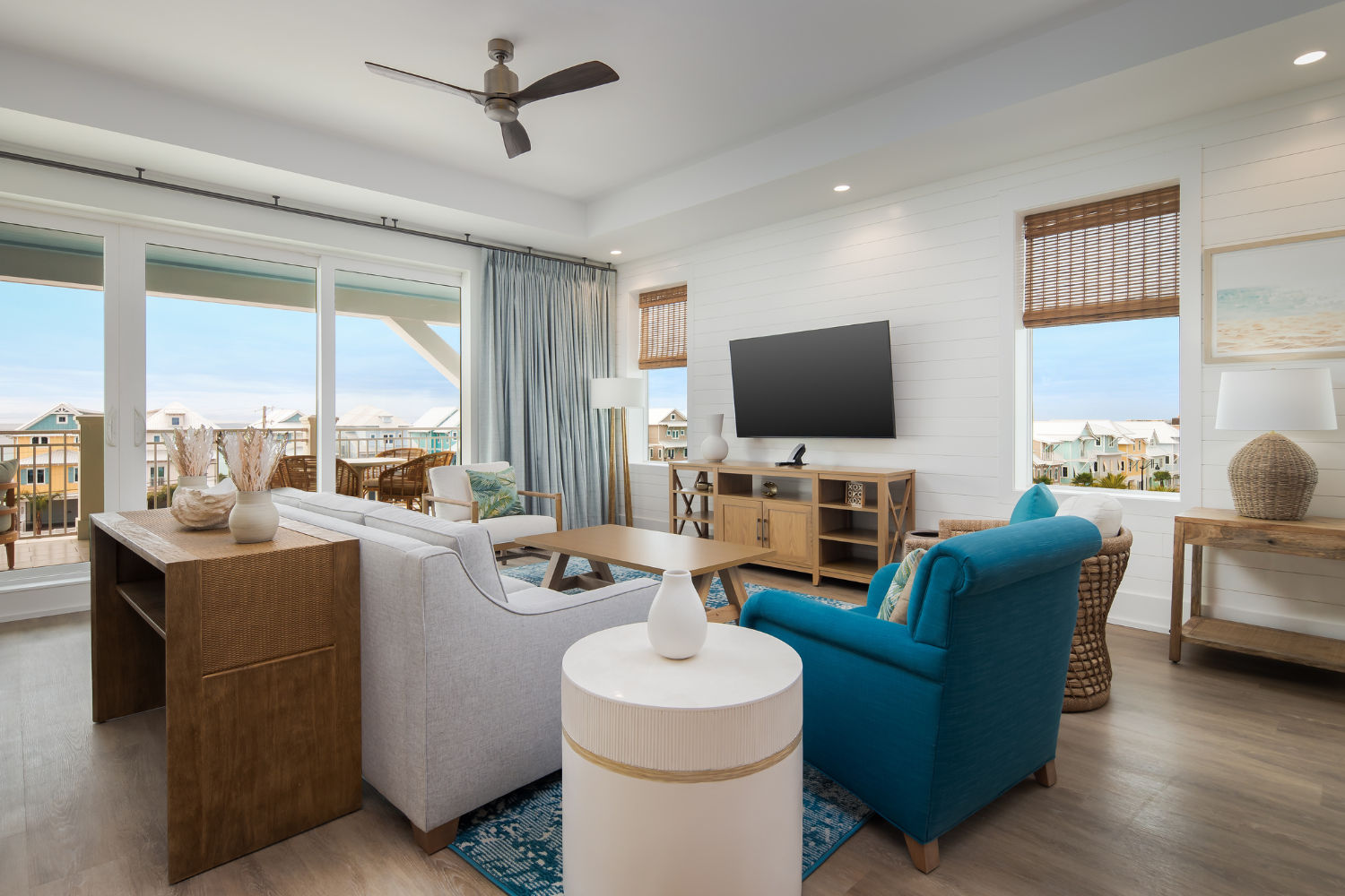 image With sweeping views of the coastline, this inviting living space blends elegant furnishings with airy coastal vibes.