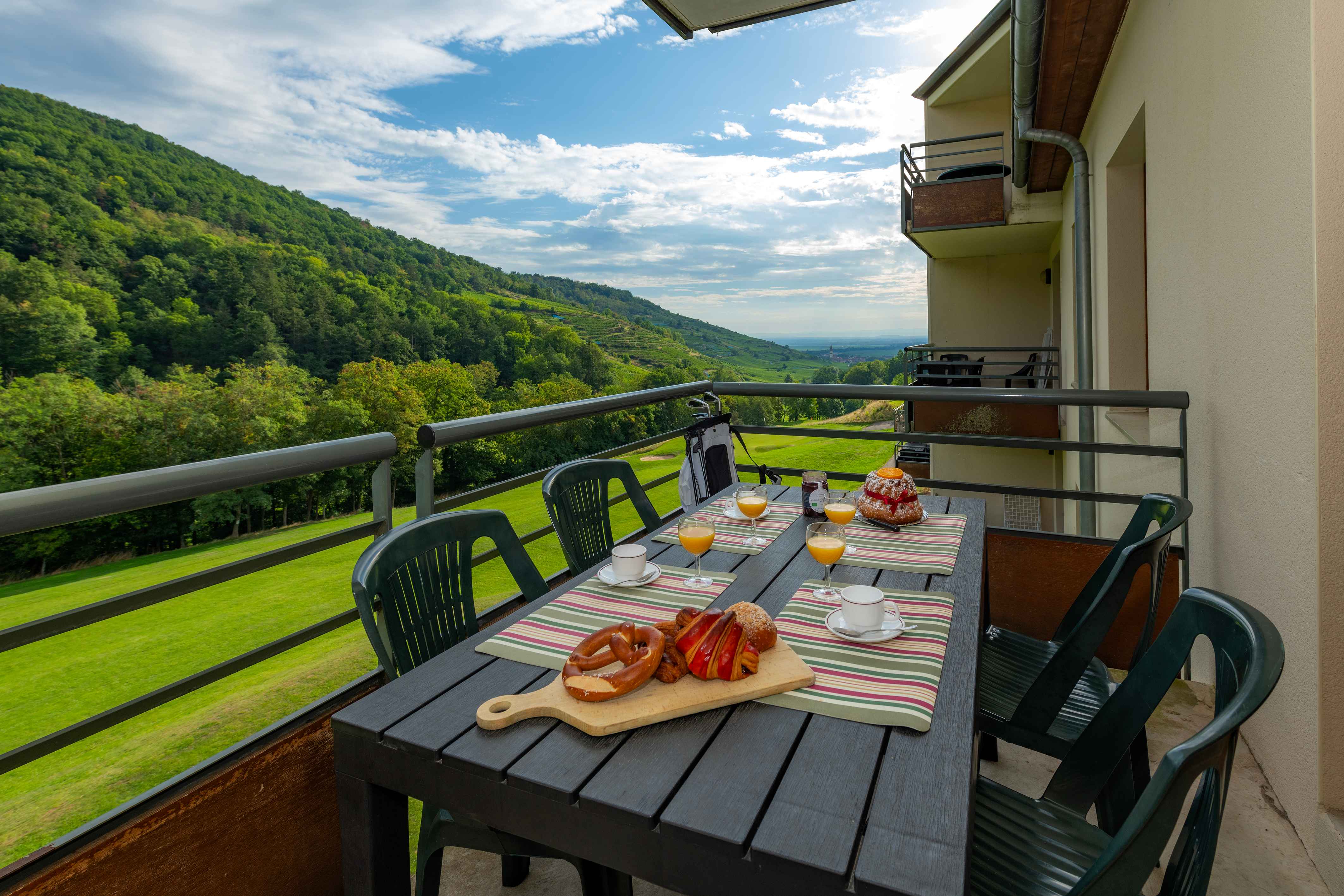 image Start the day on your private balcony with breakfast and sweeping views over the hills — a true Alsatian morning.
