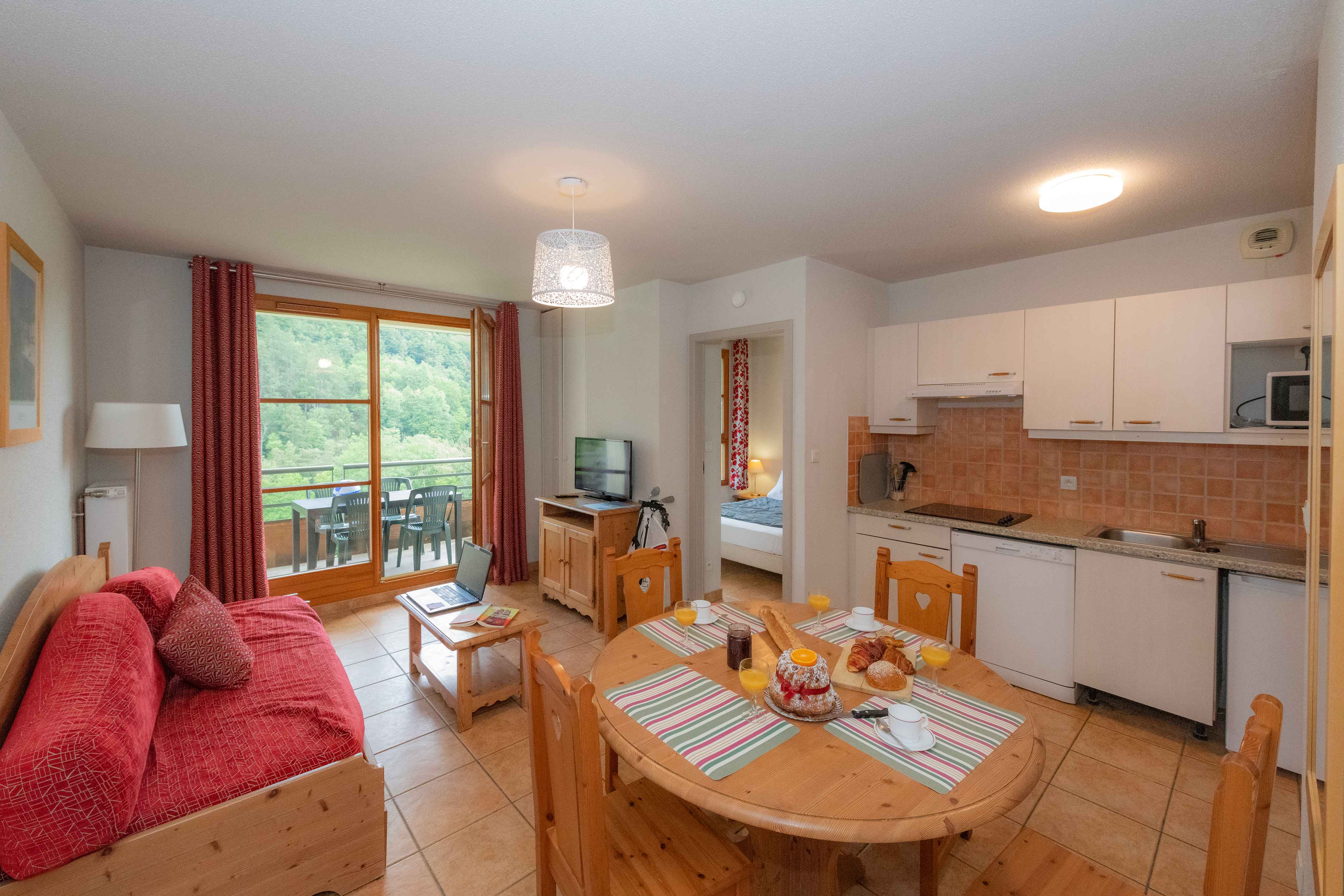 image The spacious open-plan layout comfortably accommodates a family of six, with the balcony just a few steps away.