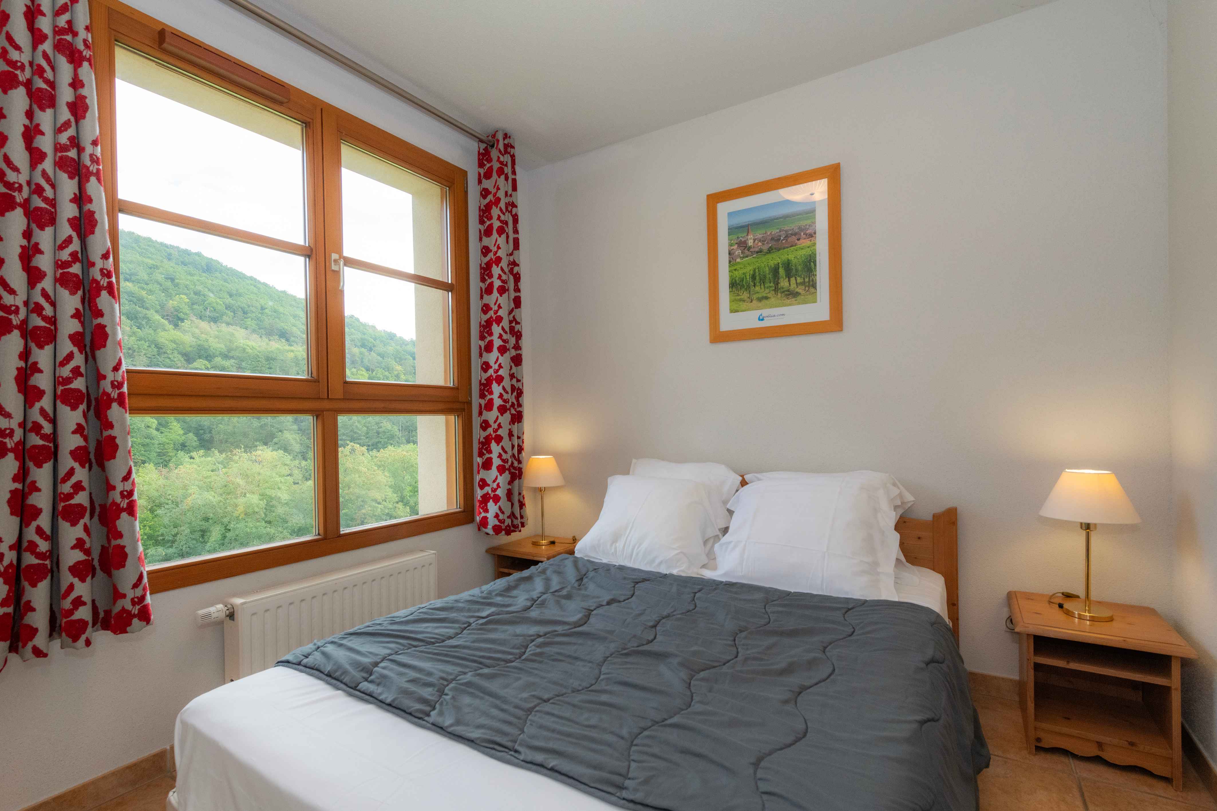 image The double bedroom offers a restful haven, with hillside views and soft natural light to ease you into each morning.