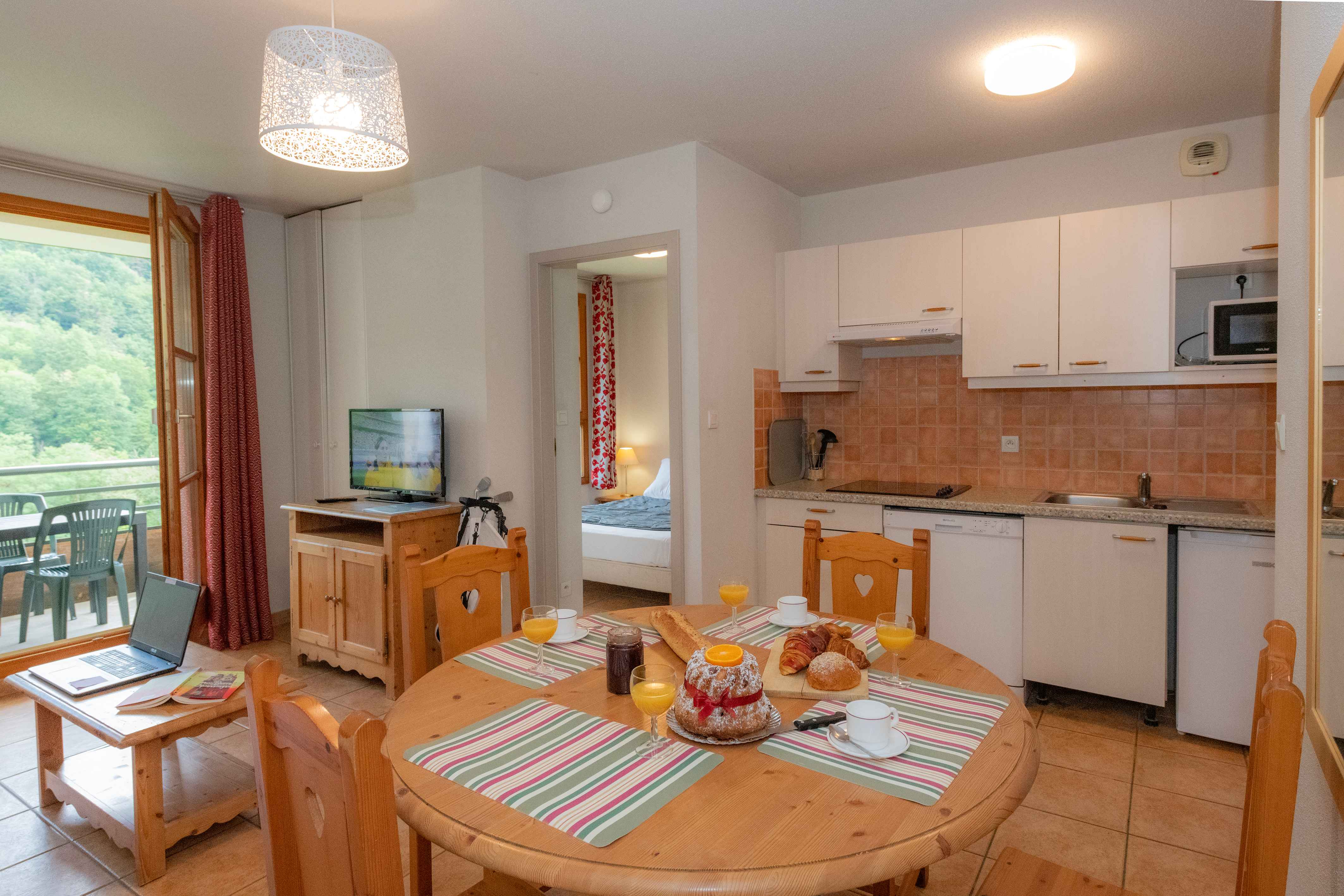 image The fully equipped open kitchen is ready for everything from morning coffee to a dinner with local Alsatian wines.