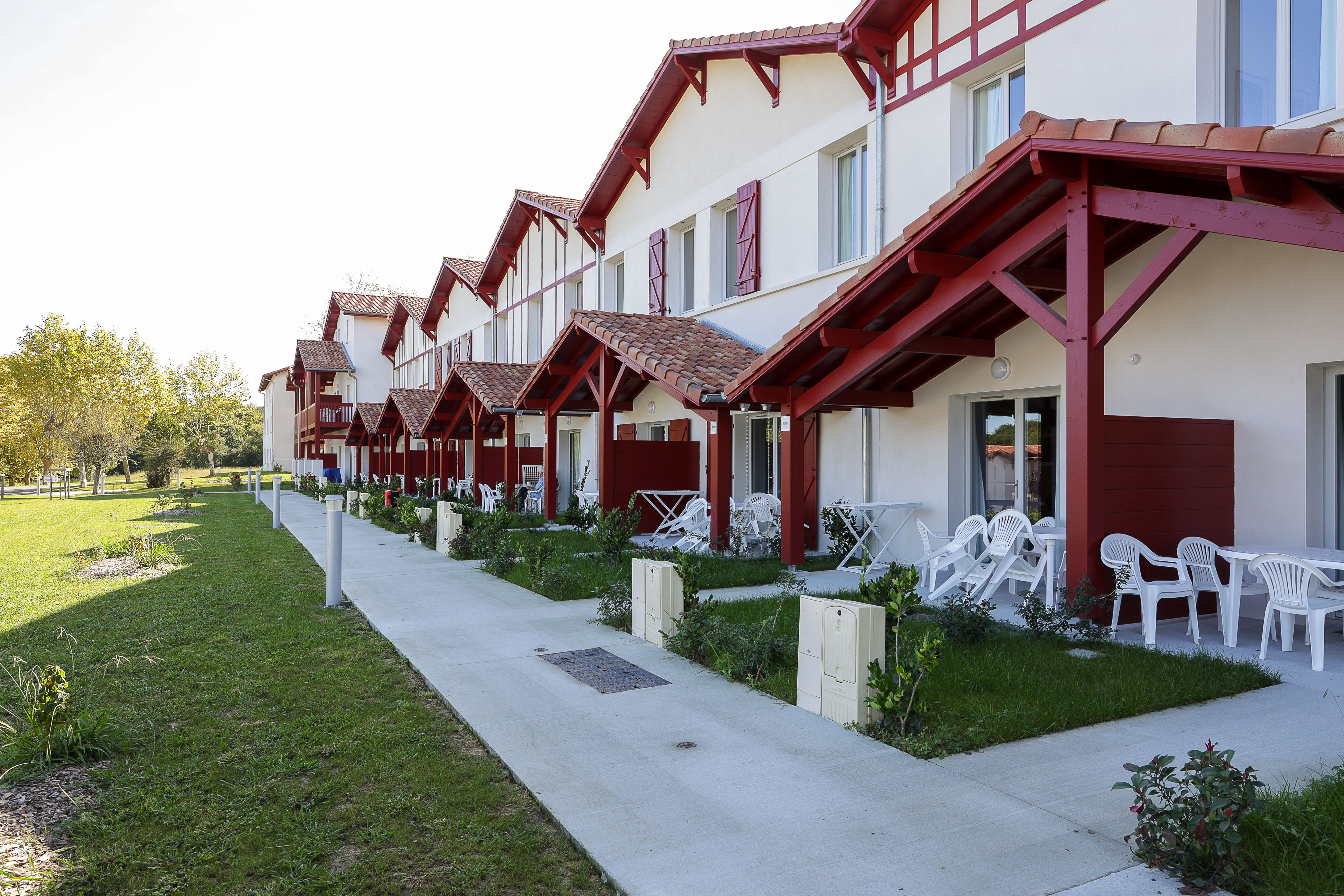 image These spacious one-bedroom apartments line the beautifully maintained grounds, each with its own terrace and easy access to the pools and resort facilities.