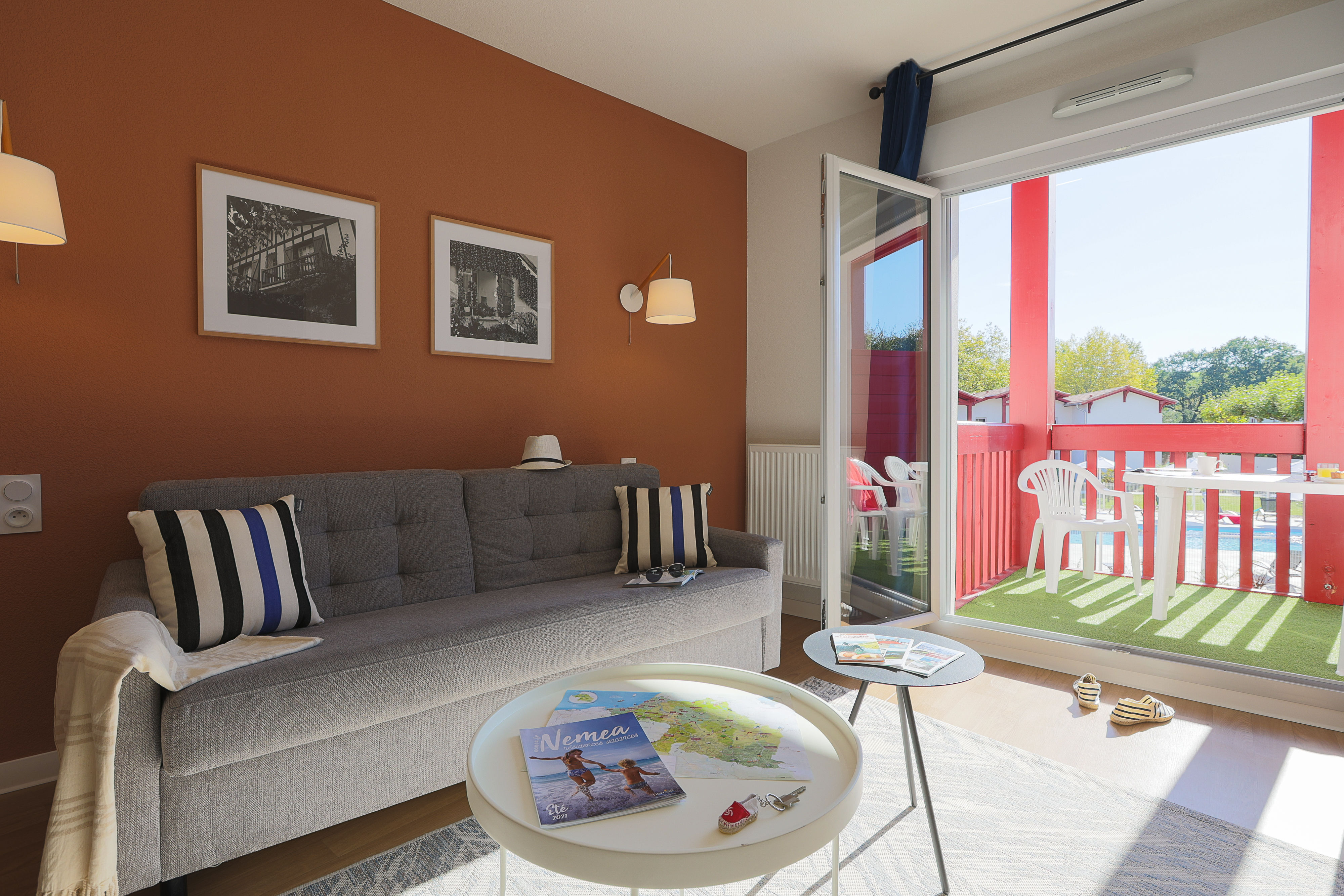 image Step straight from the living room onto your private terrace and take in the Basque countryside — a great spot for an evening apéro after a day at the outdoor pool.