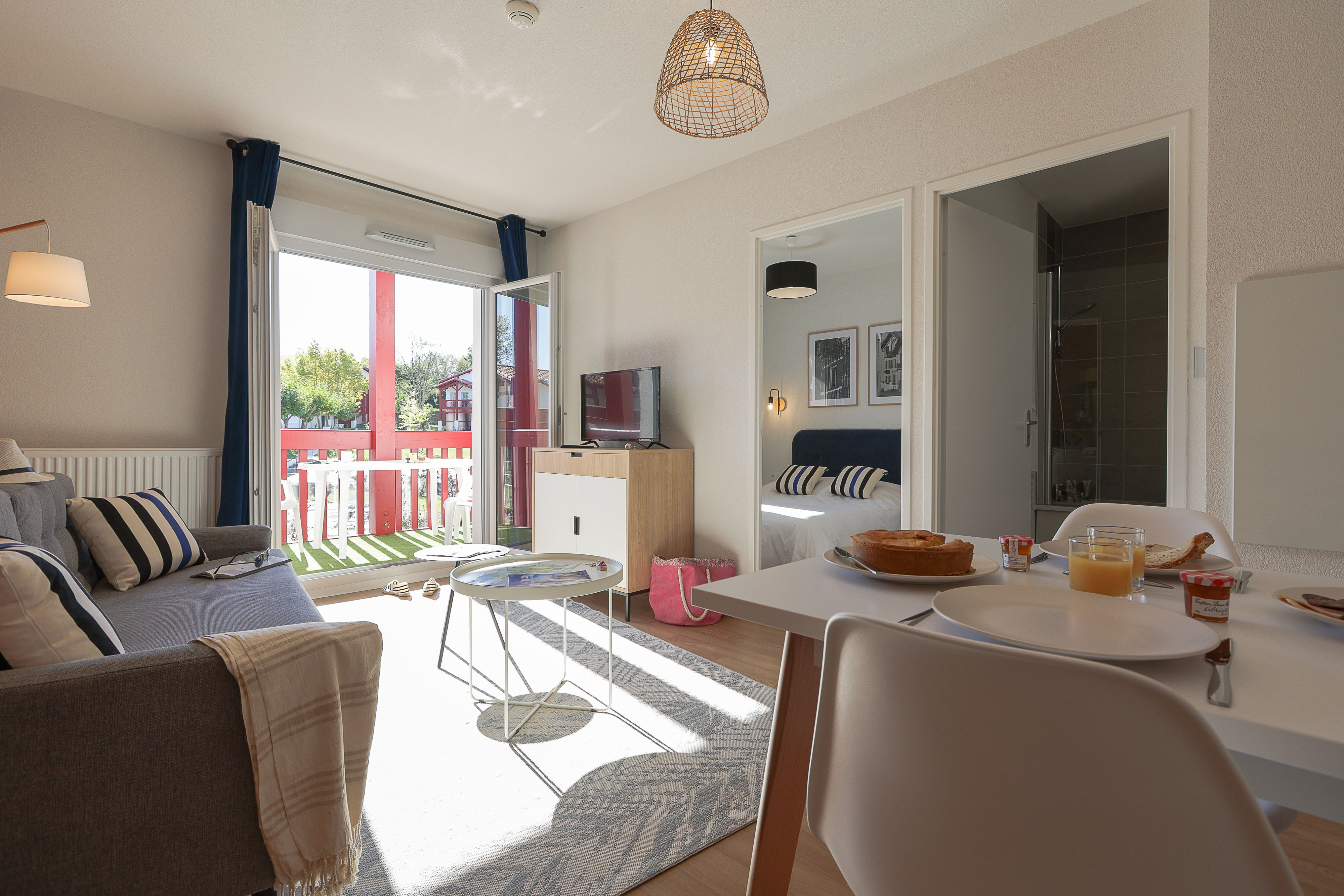 image The expansive open-plan living and dining area gives a group of eight all the room they need to relax, dine together, and feel truly at home in Urrugne.