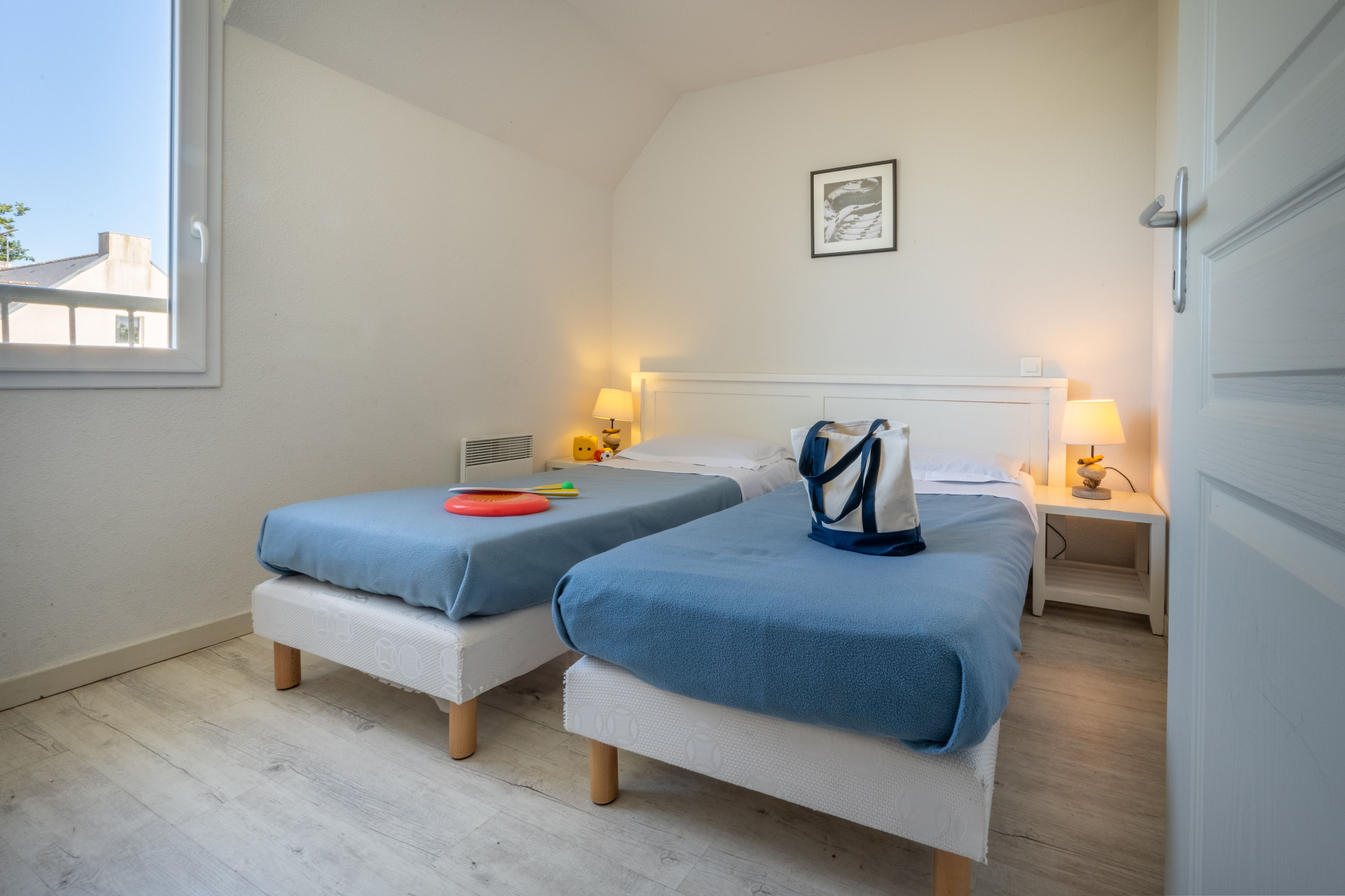 image The twin bedroom comfortably sleeps two, giving older children or extra guests their own space to settle in.