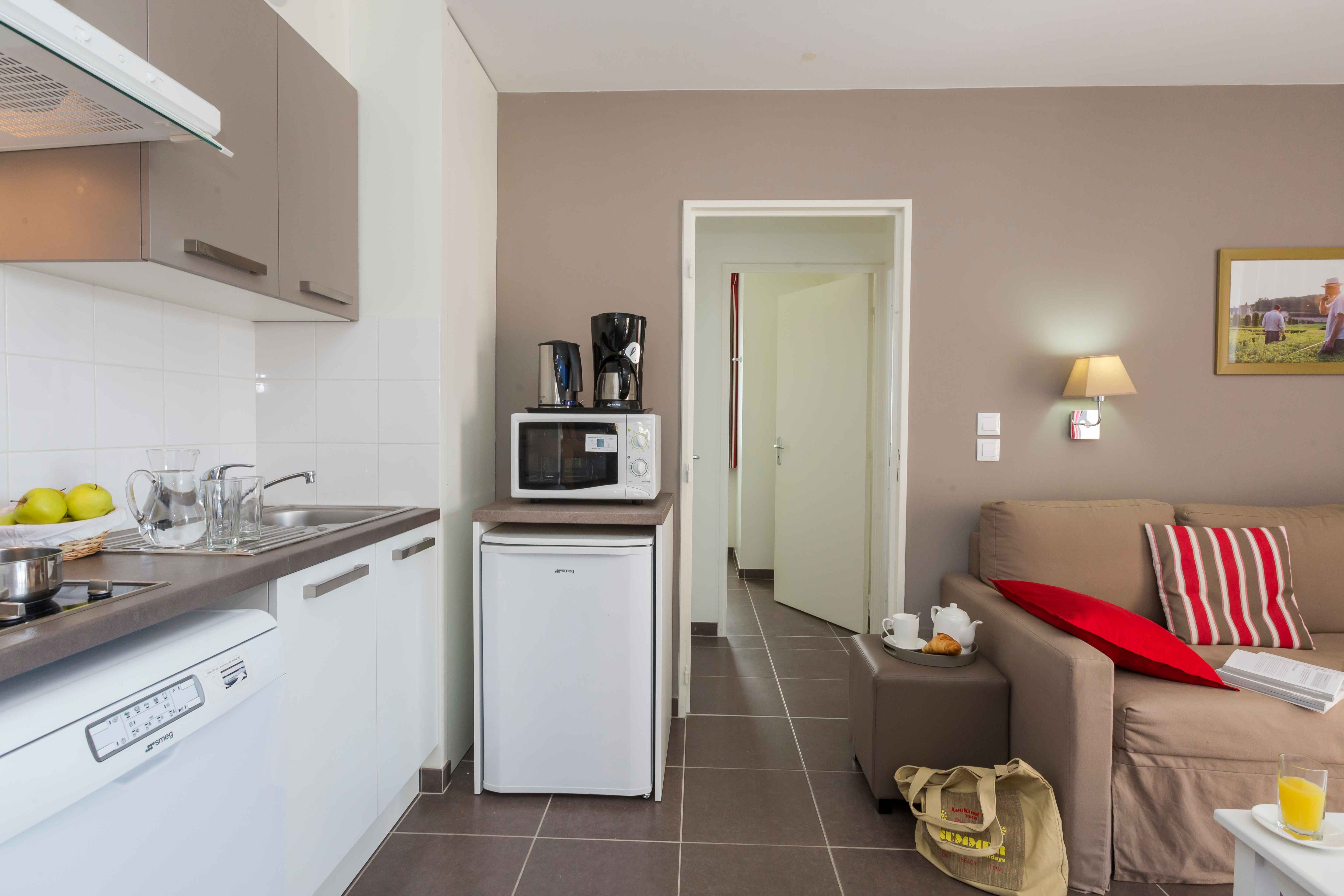 image The fully equipped kitchen makes self-catering a breeze — stock up at the local market and enjoy the flavours of the Touraine region from the comfort of your apartment.
