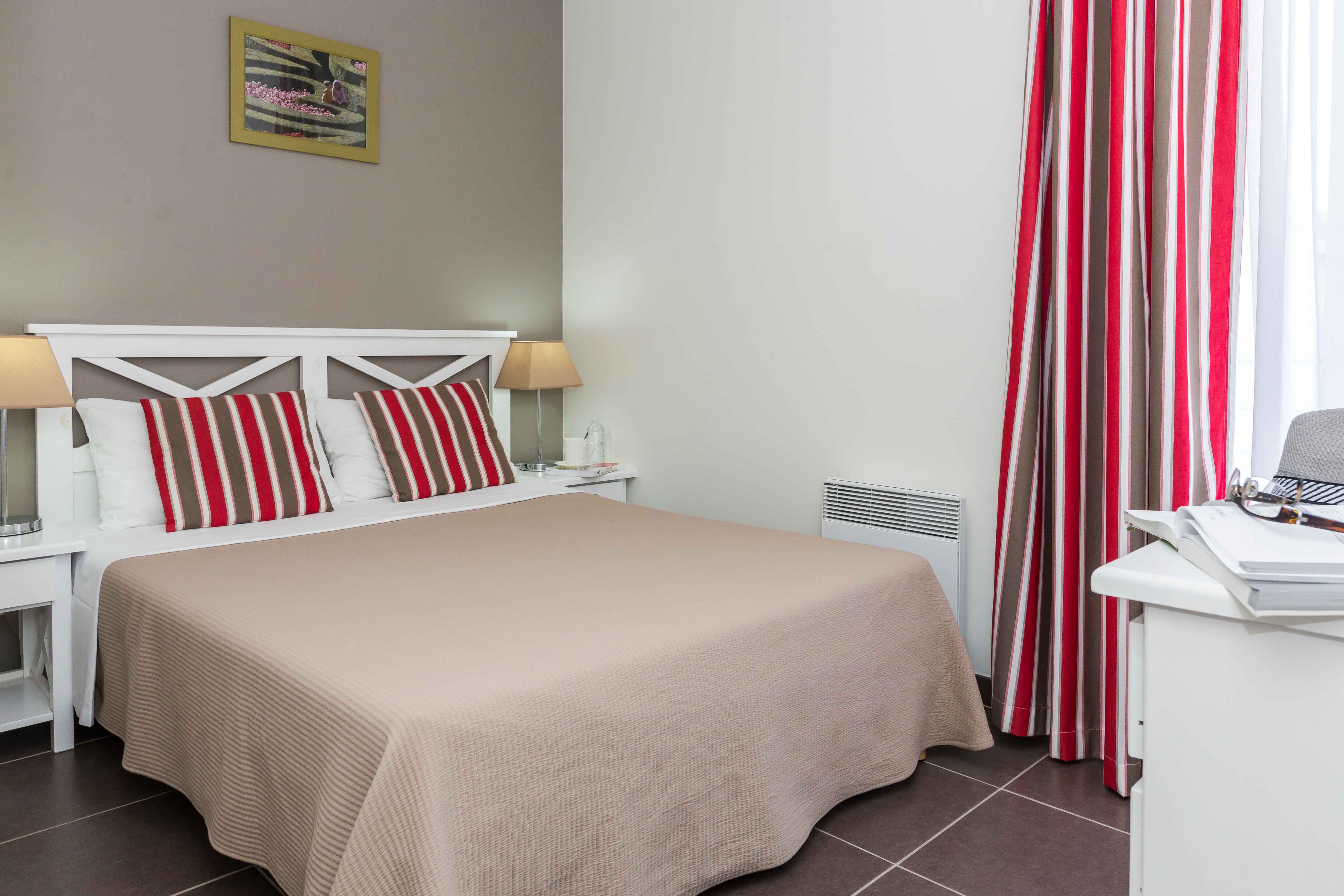 image Retire to a cosy, well-appointed bedroom after a full day touring the legendary castles and wine estates that make the Touraine one of France's most treasured regions.