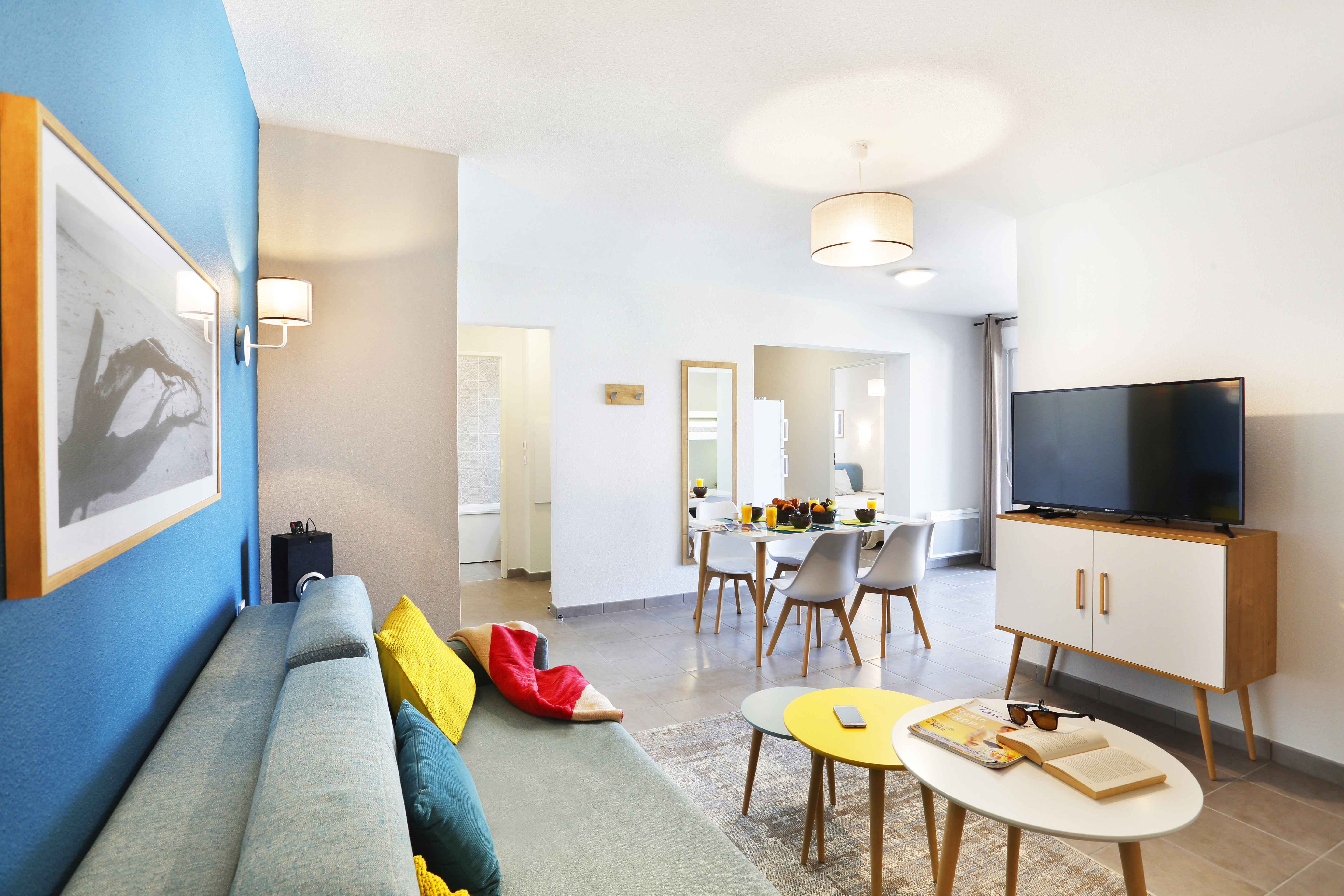 image Relax on the comfy sofa, enjoying a book or your favorite show with a colorful splash of decor all around.