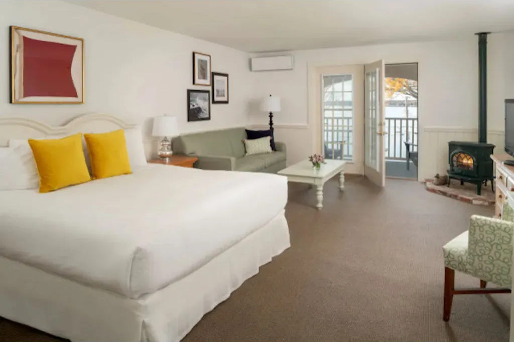 image Relax in our plush bed in this bright, welcoming room.