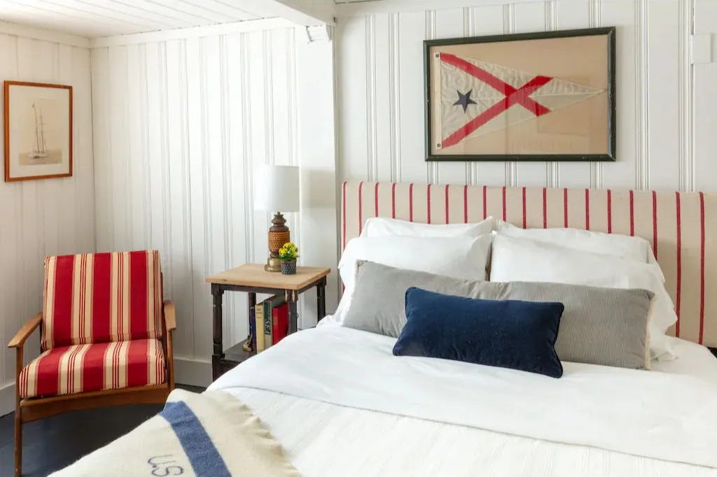 image Drift off beneath crisp linens and playful nautical touches that make rest feel effortless.