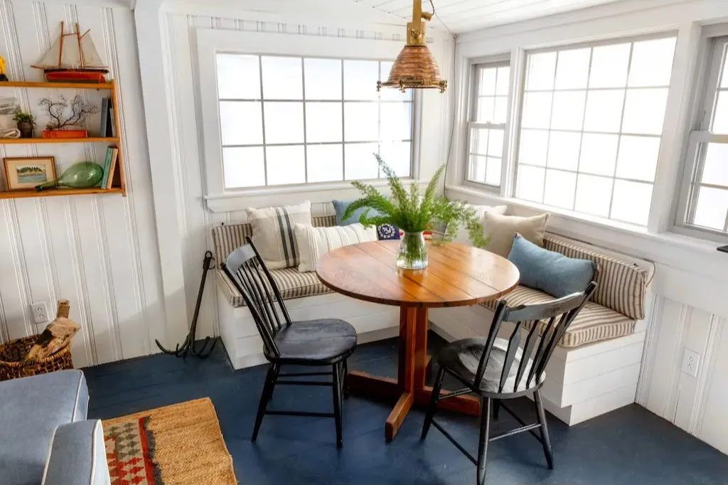 image Gather in a sunlit corner where slow mornings, warm meals, and conversation linger long after the plates are cleared.