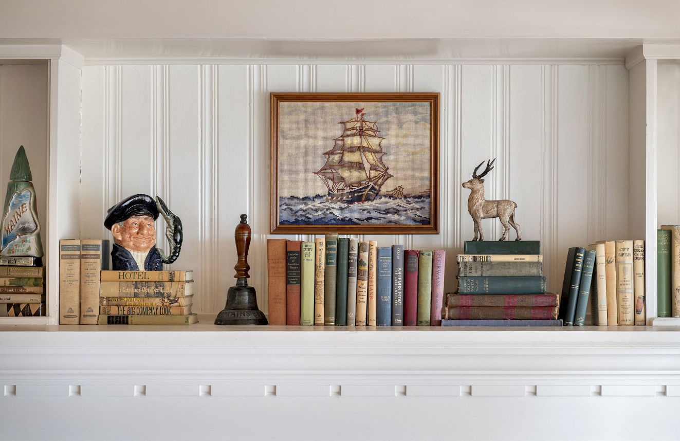 image Maritime treasures and vintage books tell stories of the sea, lending character and warmth to your stay.