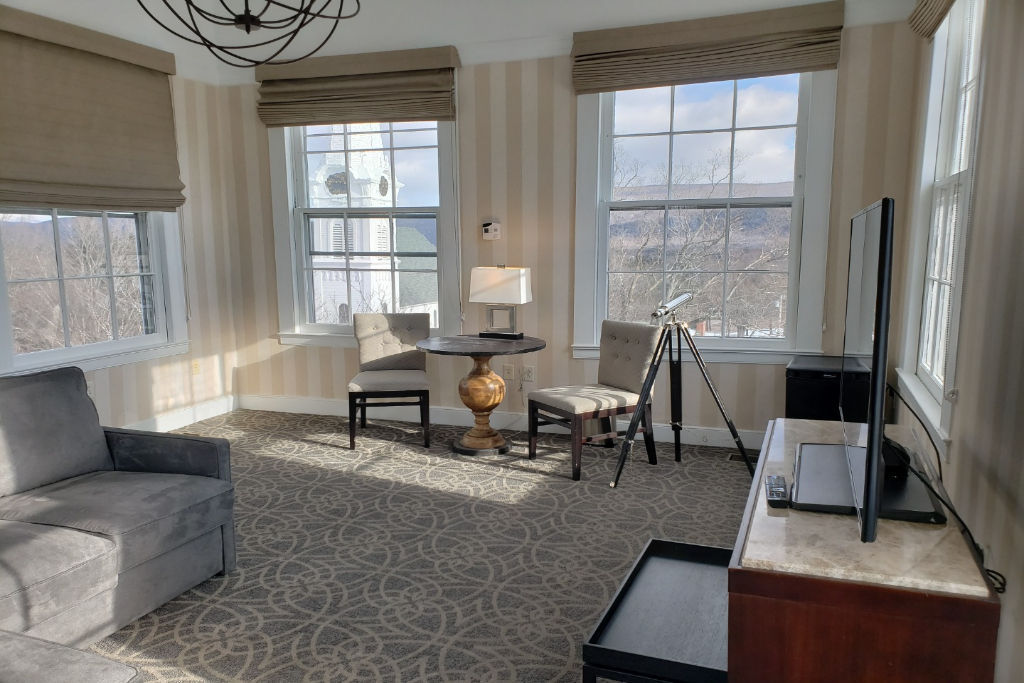 image Step into a panoramic sanctuary bathed in sunlight, where spaciousness and modern design coalesce to create an idyllic retreat.