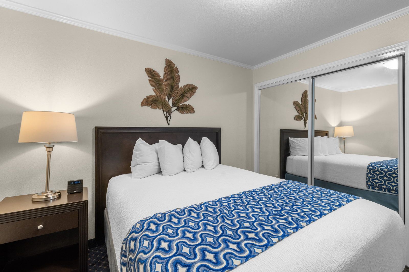 image Sleep comfortably in this cozy bedroom, adorned with relaxing colors and inviting decor.